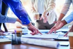 Hands with blueprint