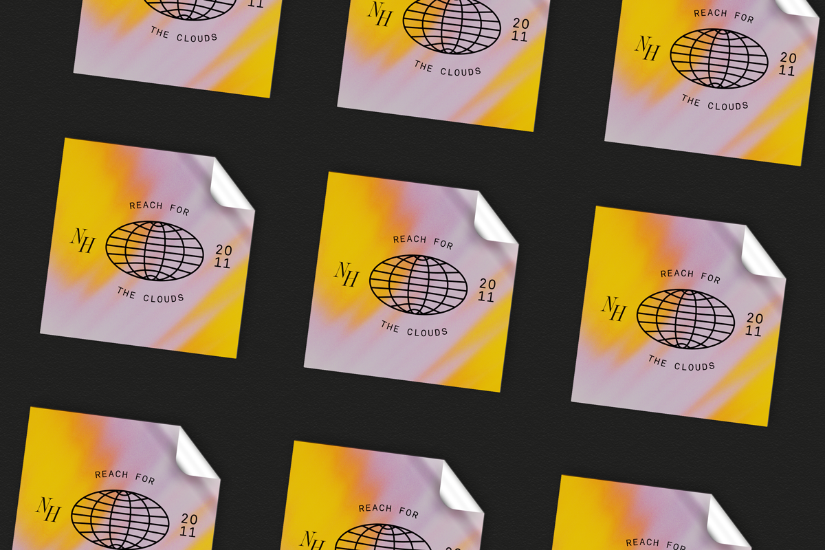 Multiple square stickers with a yellow and purple gradient background, featuring a black globe outline, the text "REACH FOR THE CLOUDS", and the abbreviation "NH" with the year "2011".