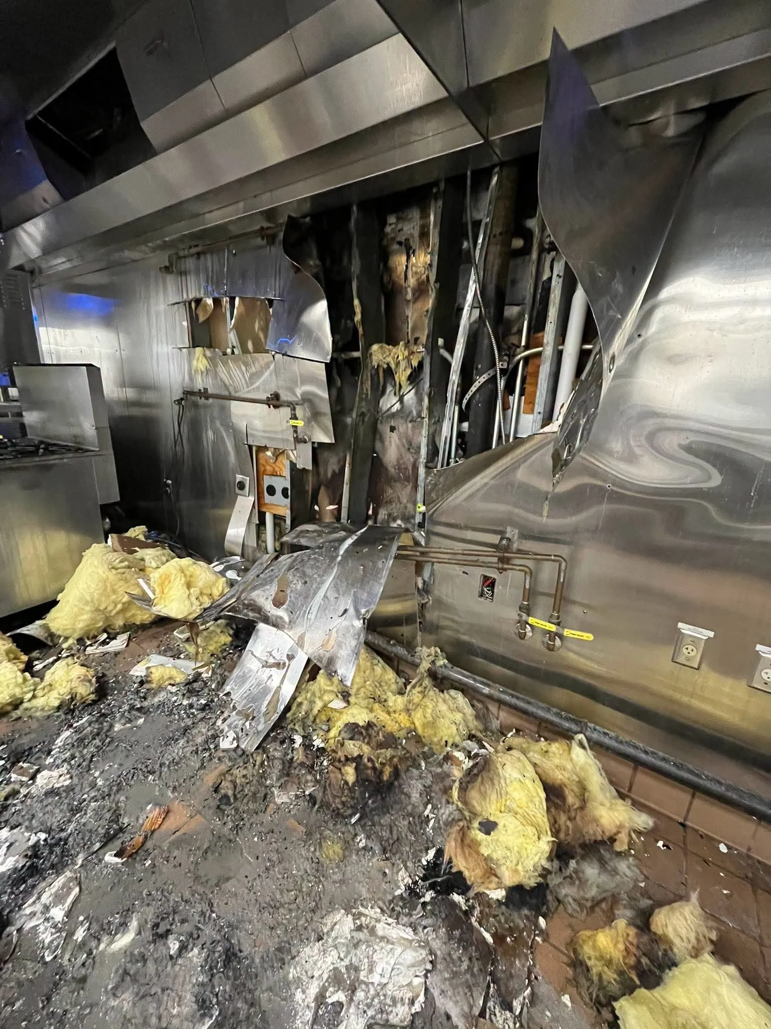 Fire damage inside the Embassy Suites Murfreesboro commercial kitchen before On-Site's temporary kitchen arrived