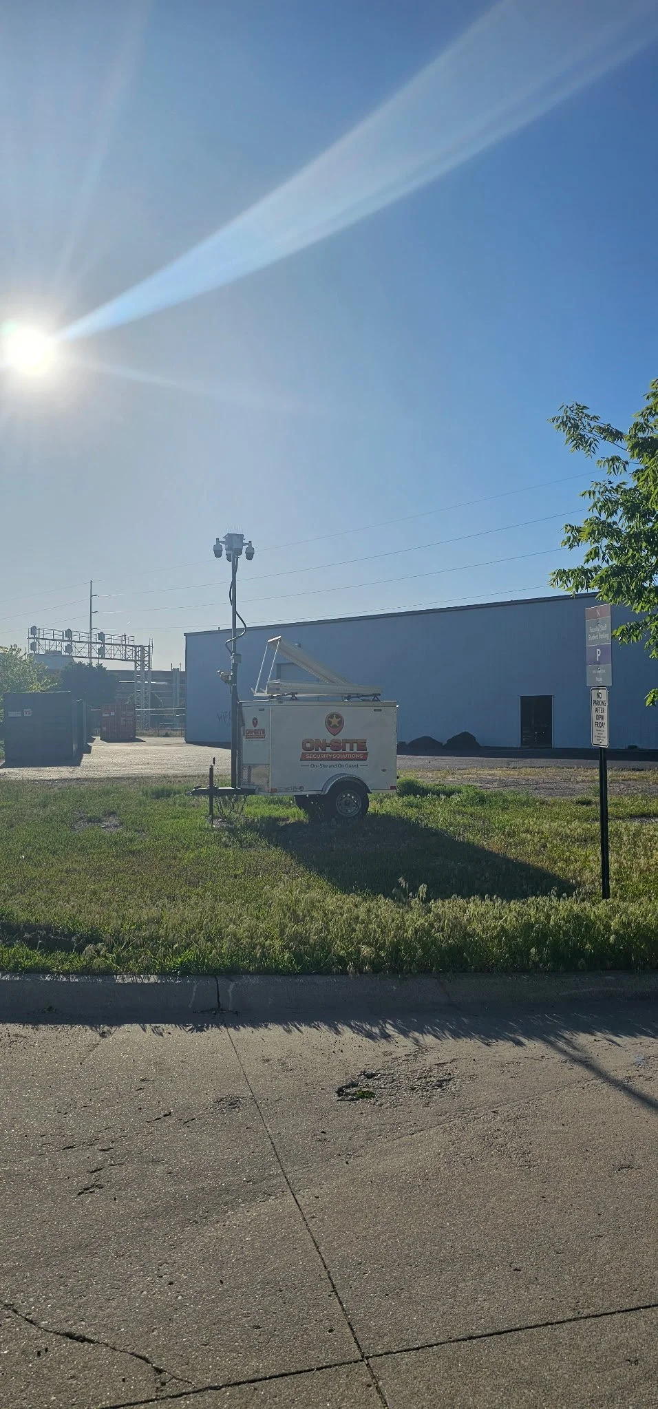 Rapid-deploy On-Site surveillance camera tower monitoring a commercial lot and perimeter