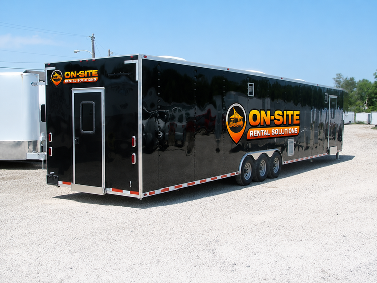 Bunkhouse trailer exterior, entry side and rear three-quarter view