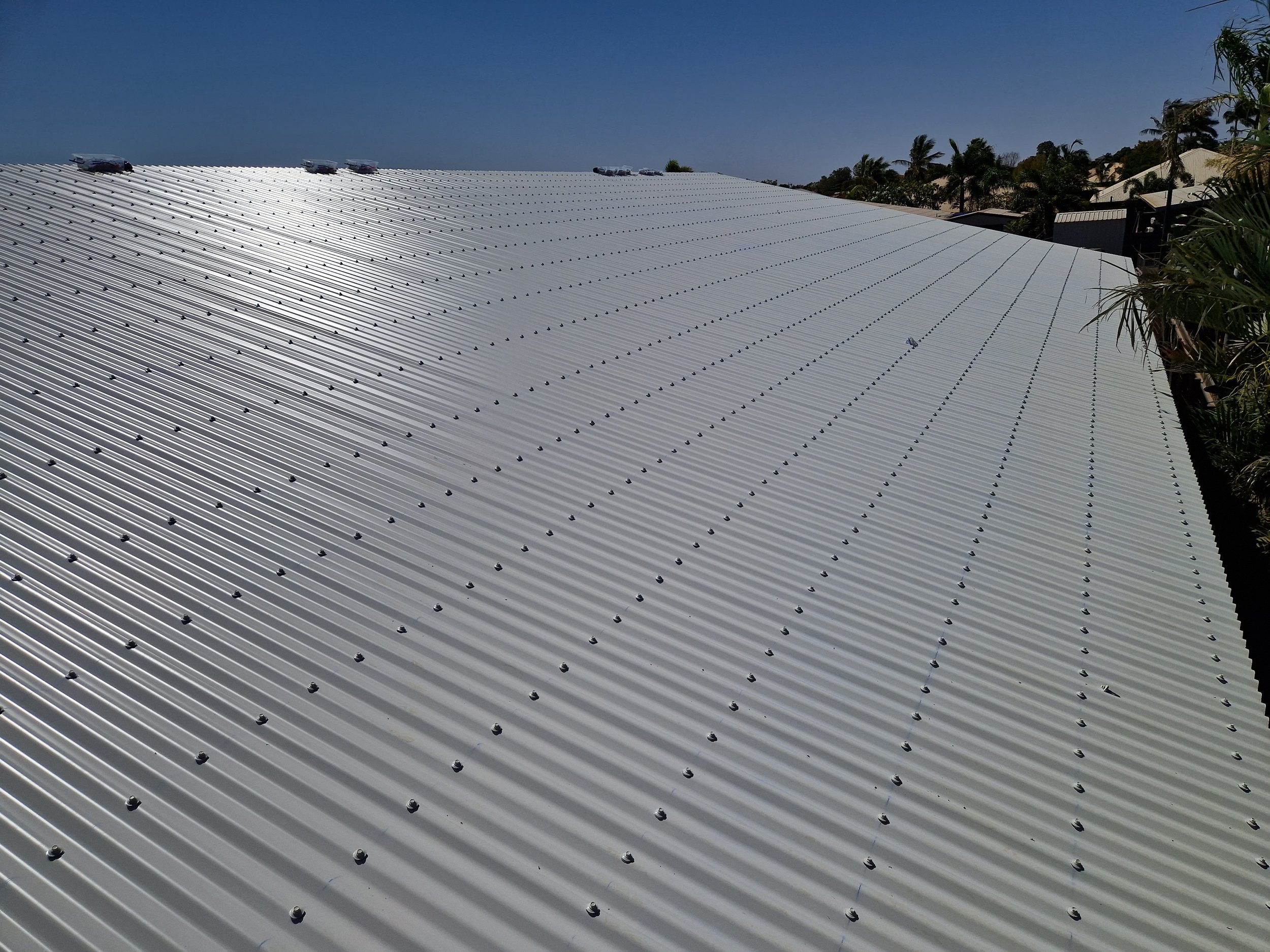 corrugated-metal-roof-sheet-installation.jpg.jpg