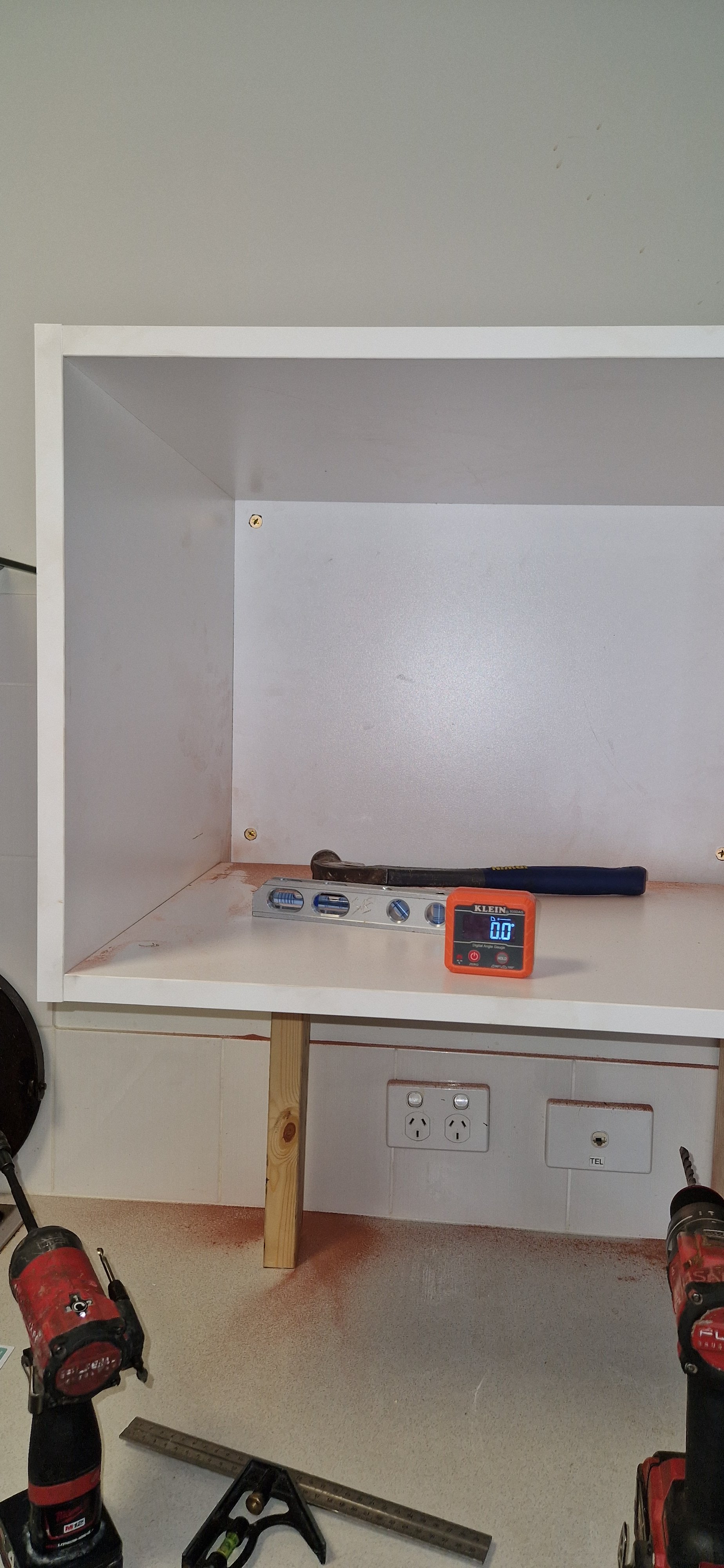 custom-wall-cabinet-installation-carpentry.jpg.jpg
