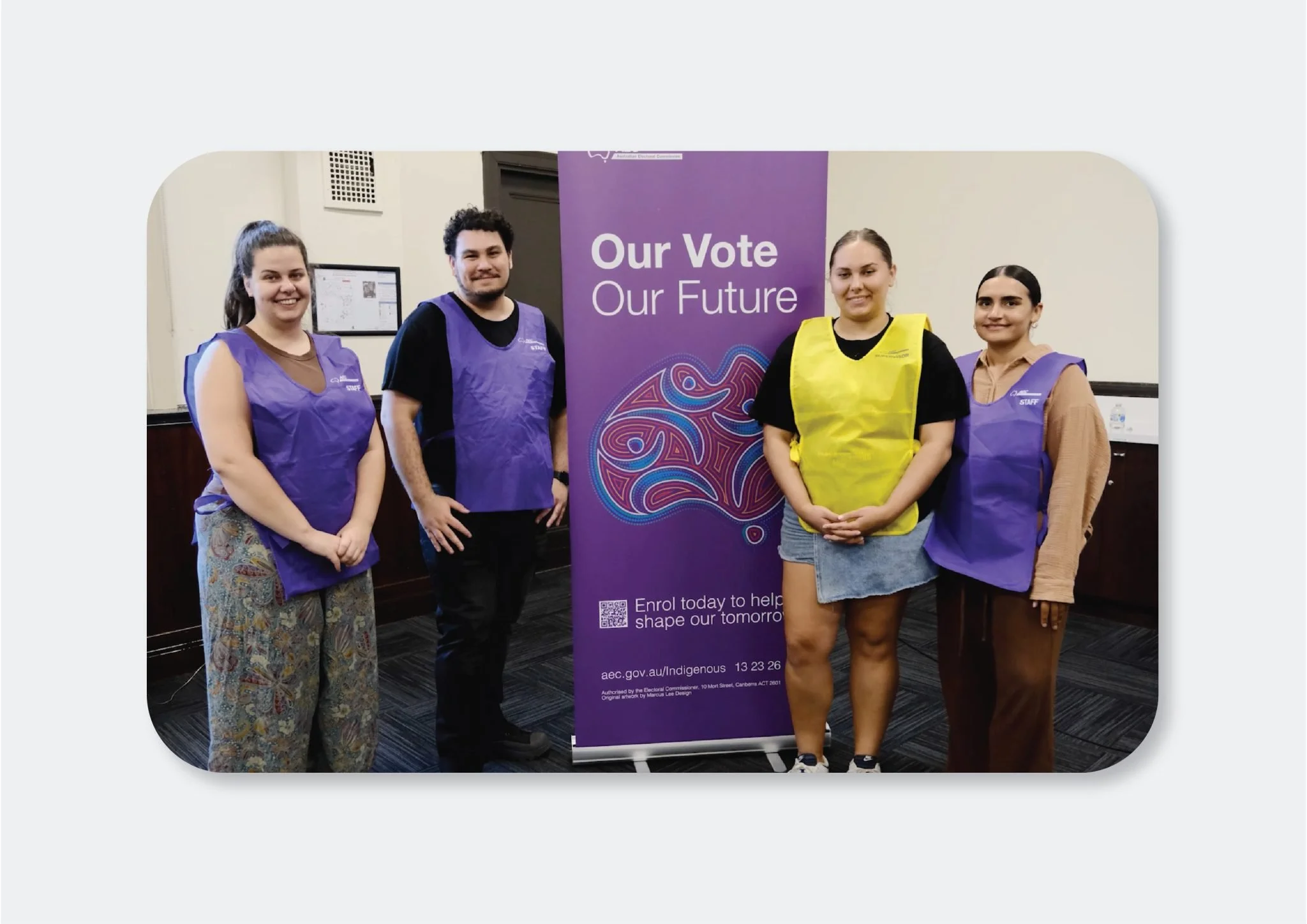 4 Young Leaders standing in front of a promotional banner with the words 'Our Vote, Our Futre, Enrole today to help shape our tomorrow'.
