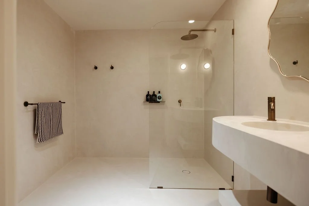 Spacious bathroom with micro finishes and boujee fixtures