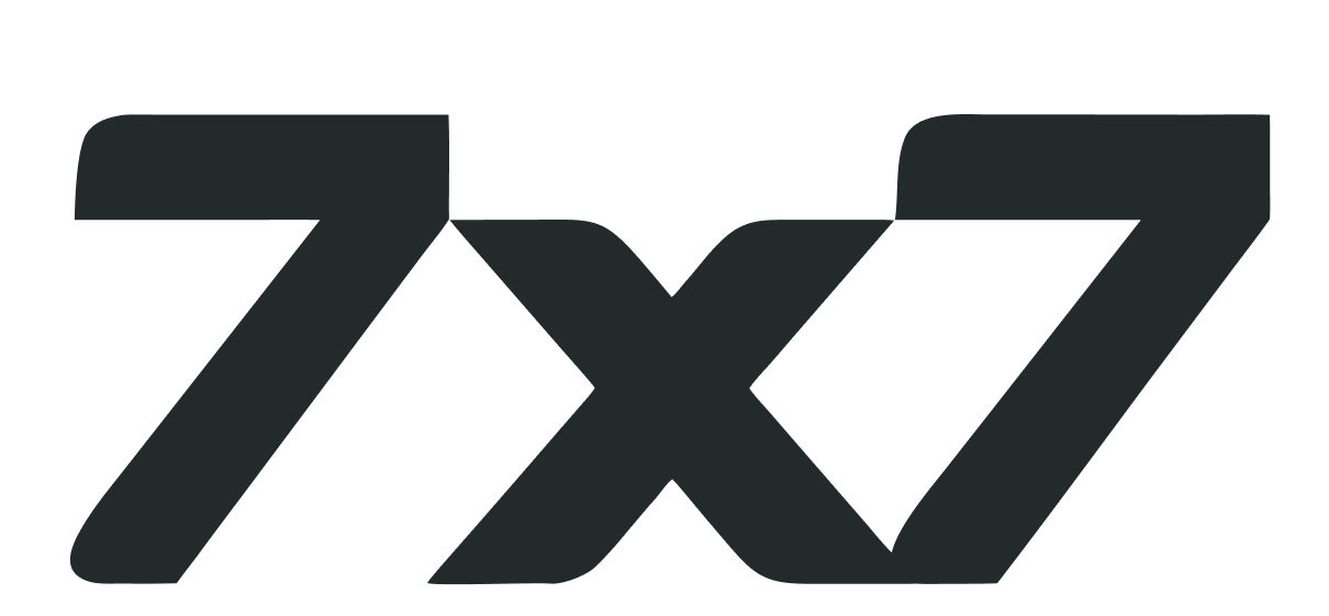 Stylized black logo with overlapping letters '7' and 'X' in a modern design.