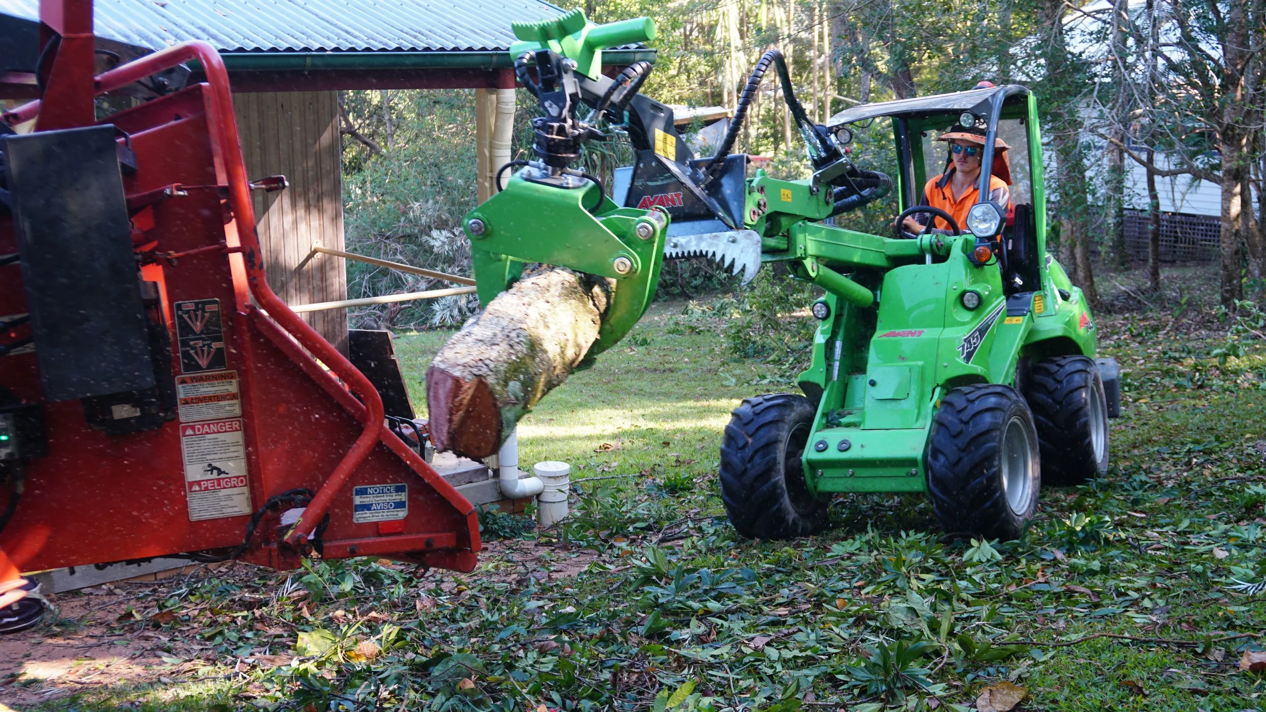 loading branches into chipper using grab