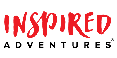 The word 'INSPIRED' written in bold red handwritten-style font.