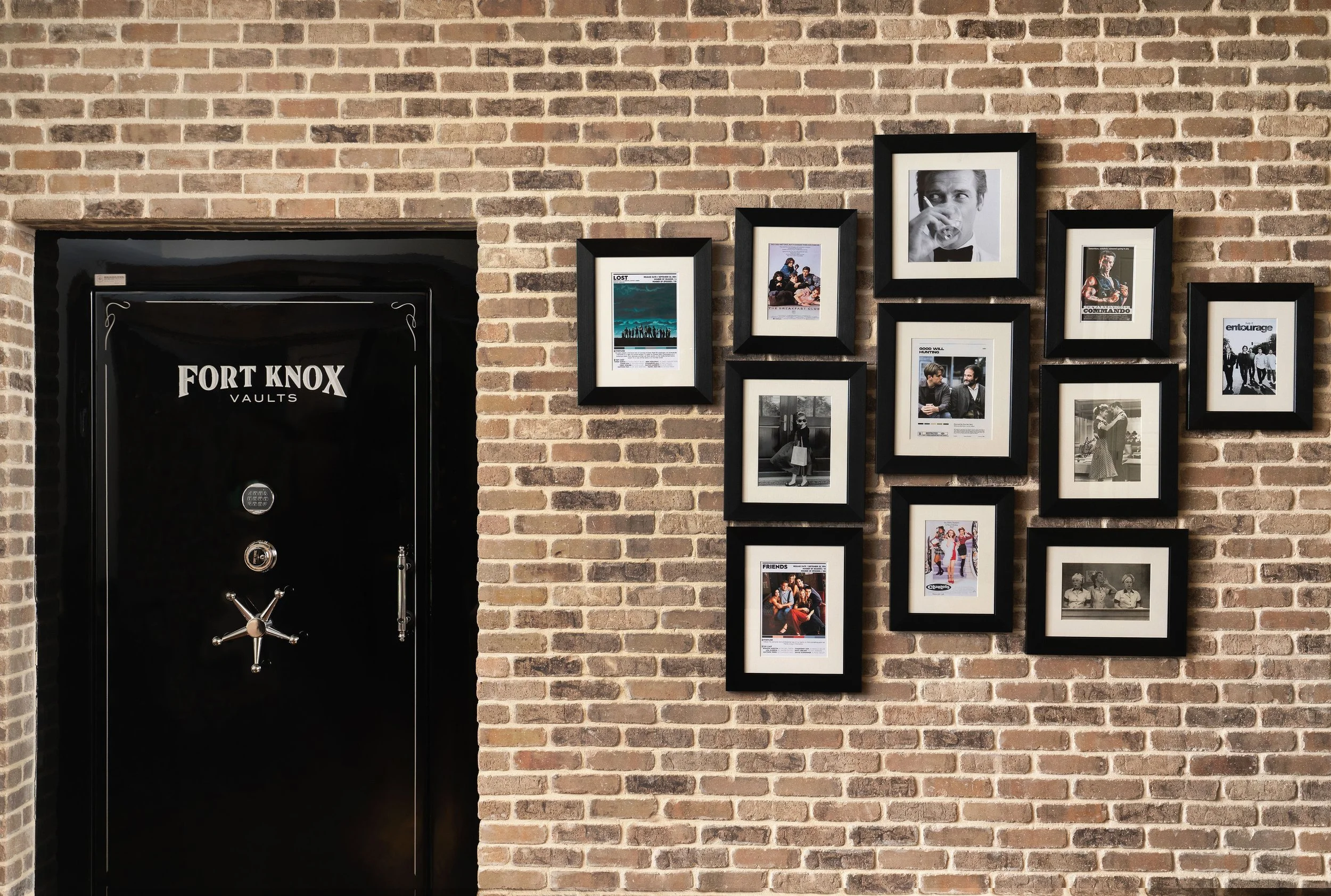 Safe and gallery wall design by Interior Styles, interior design in North Georgia.