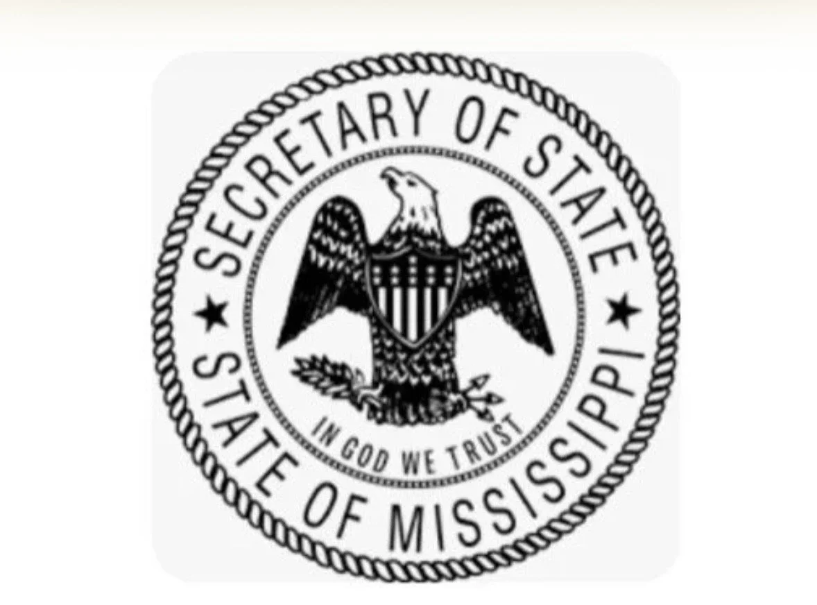 Seal of the Secretary of State of Mississippi featuring an eagle and the motto 'In God We Trust'. 
Credential for Julia Lansdell, notary public in Tupelo, MS at Legacy Signing Services LLC.