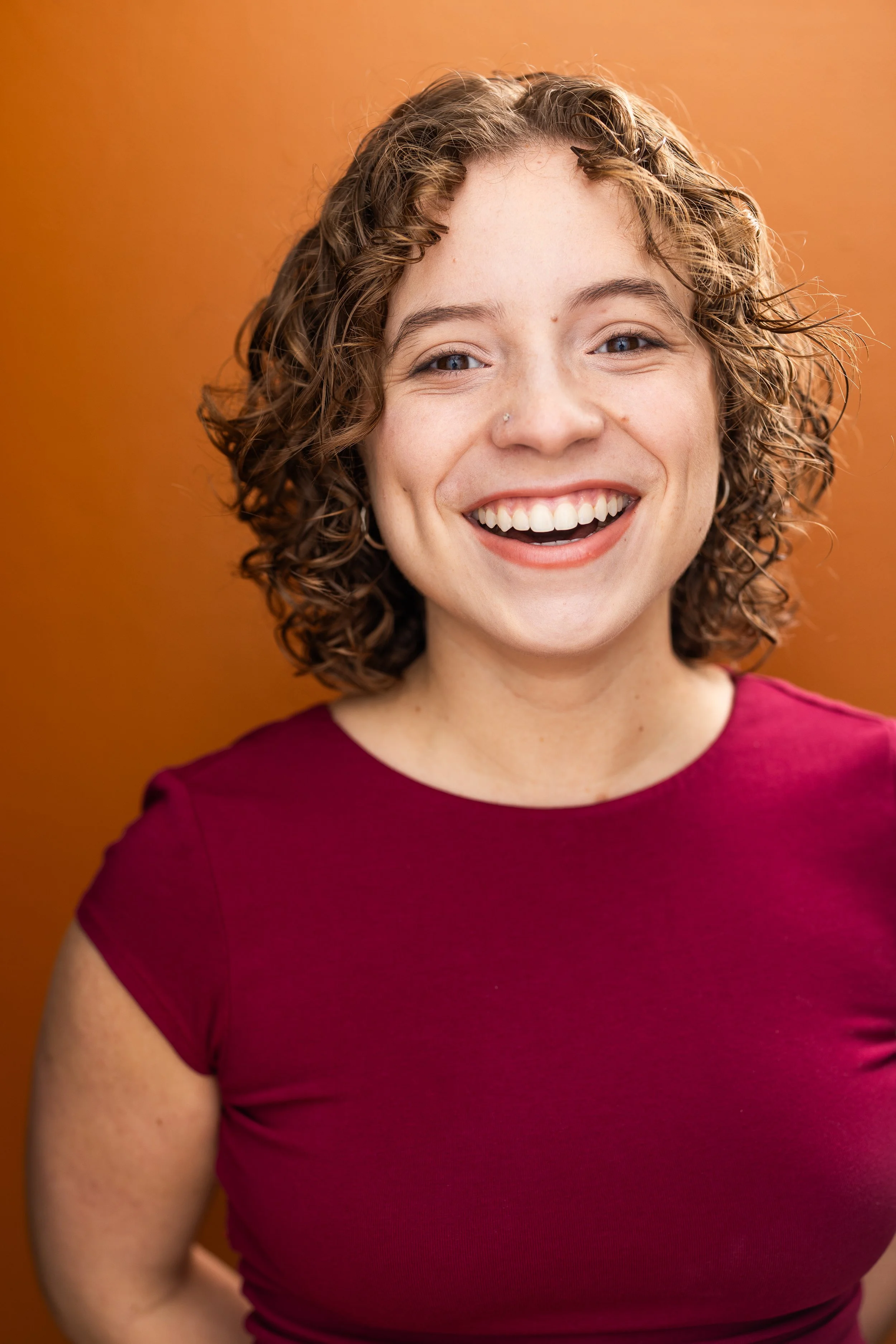 Eva Cirilo bright commercial headshot smiling