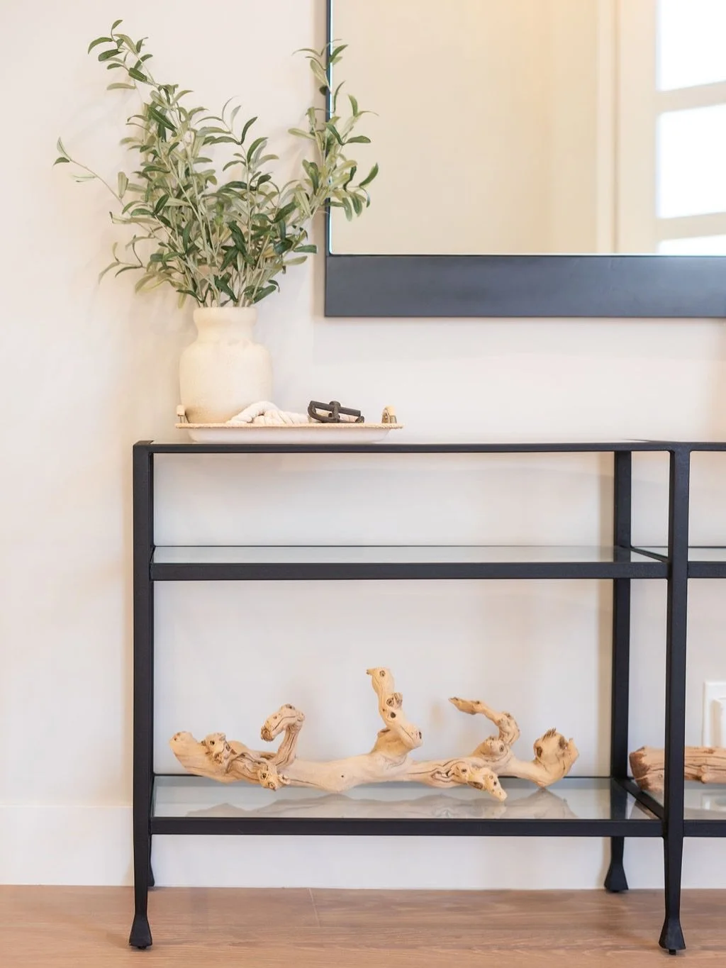 Decor doesn&rsquo;t need to be overthought.

The best spaces tell a story. Instead of filling shelves with things just to fill them, choose pieces that mean something. My go-to is always objects found in nature&mdash;branches, driftwood, wood knots, 