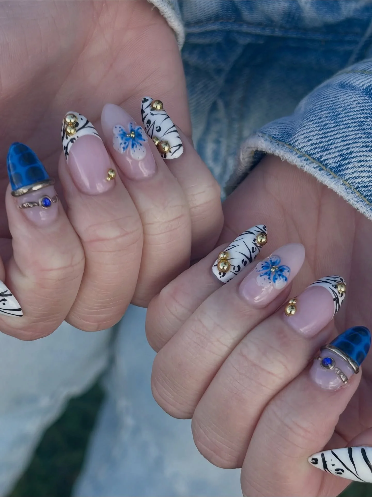 Full set reveal!!! I&rsquo;m definitely jealous of these nails 💙
Set inspo from @maddiej_nails 

#aprilnailart #utahnailtech #coolgirlnails #animalprintnails #nailinspo