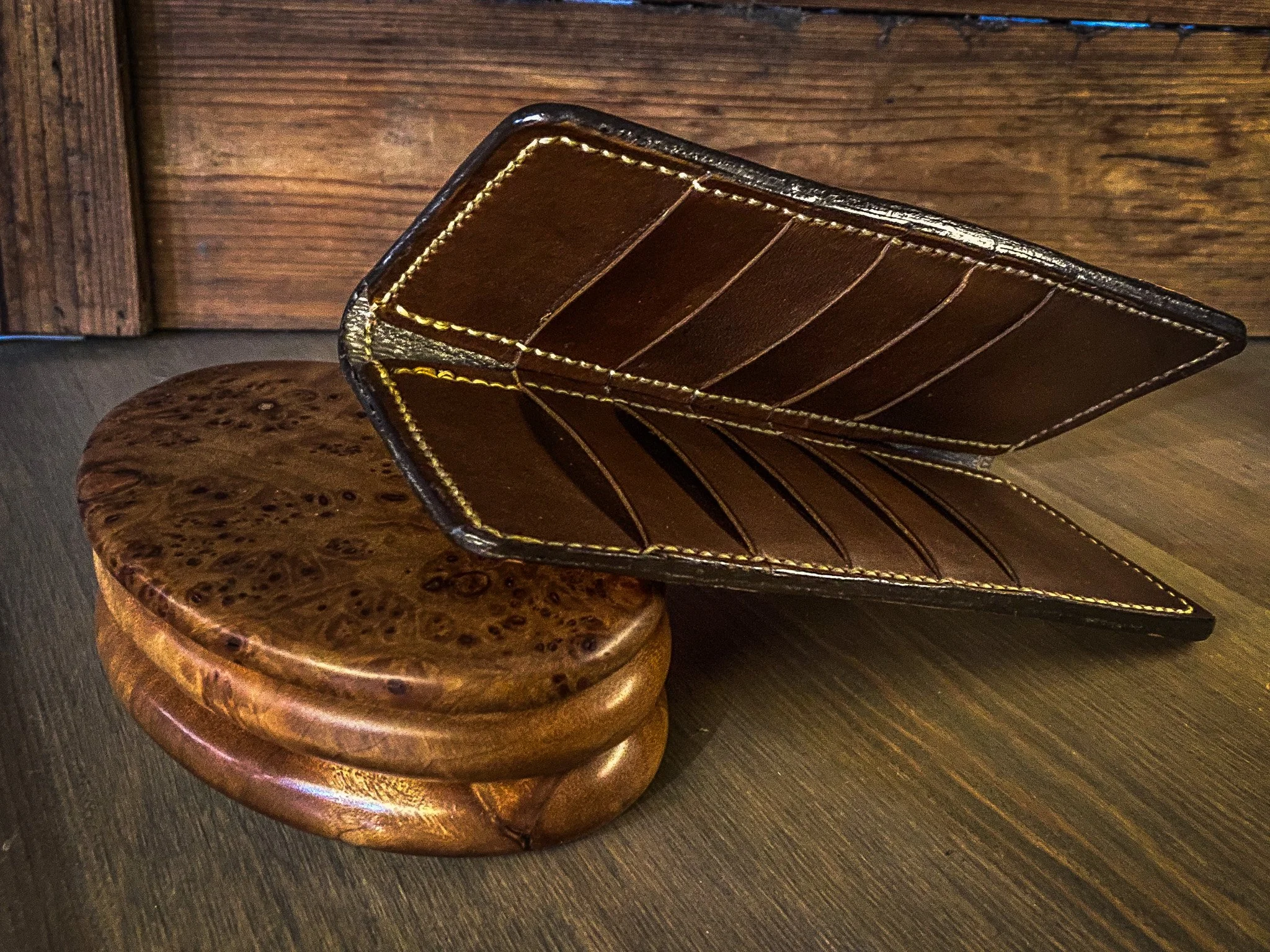 Hand-Tooled Leather Wallet with Floral Design.