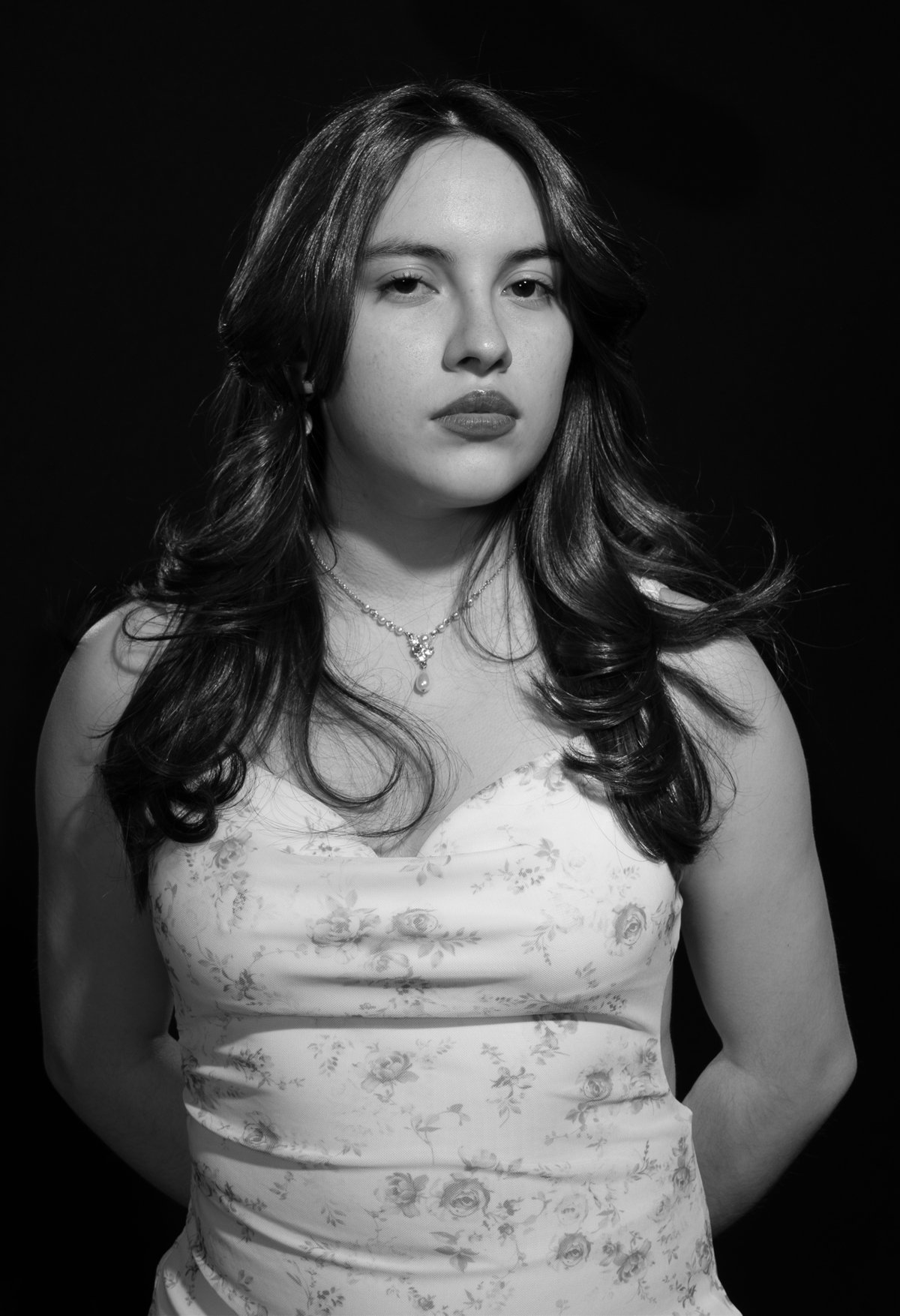 Cosmetics graduate Jissel in a high-contrast black and white Hollywood glamour portrait at Humber College studio.