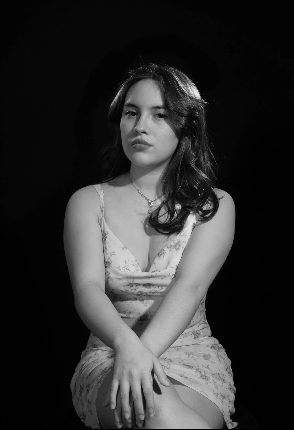 Jissel posing for a vintage Hollywood style black and white photoshoot at Humber College North Campus.