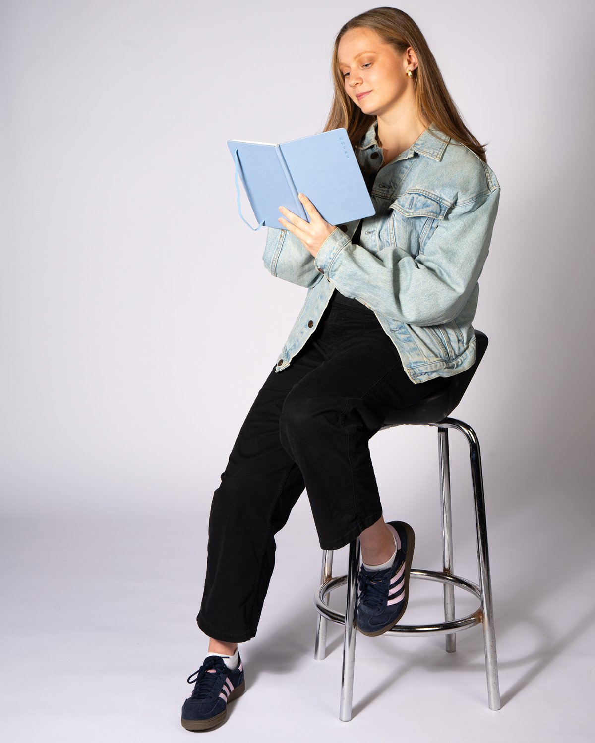 Kinesiology student Julie Harris posing for an editorial high-key portrait at University of Guelph-Humber.
