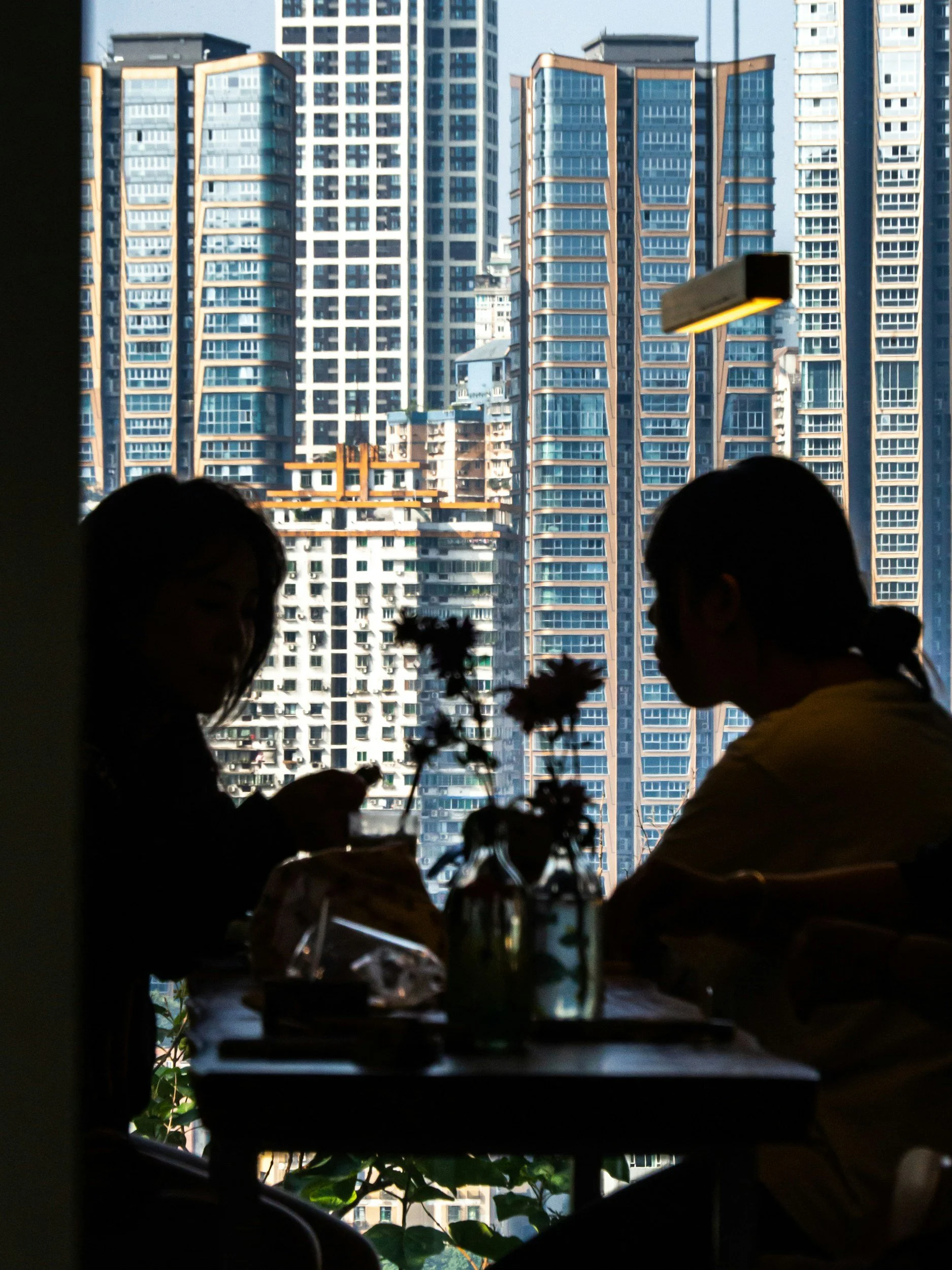 chatting grounded calm with busy building view
