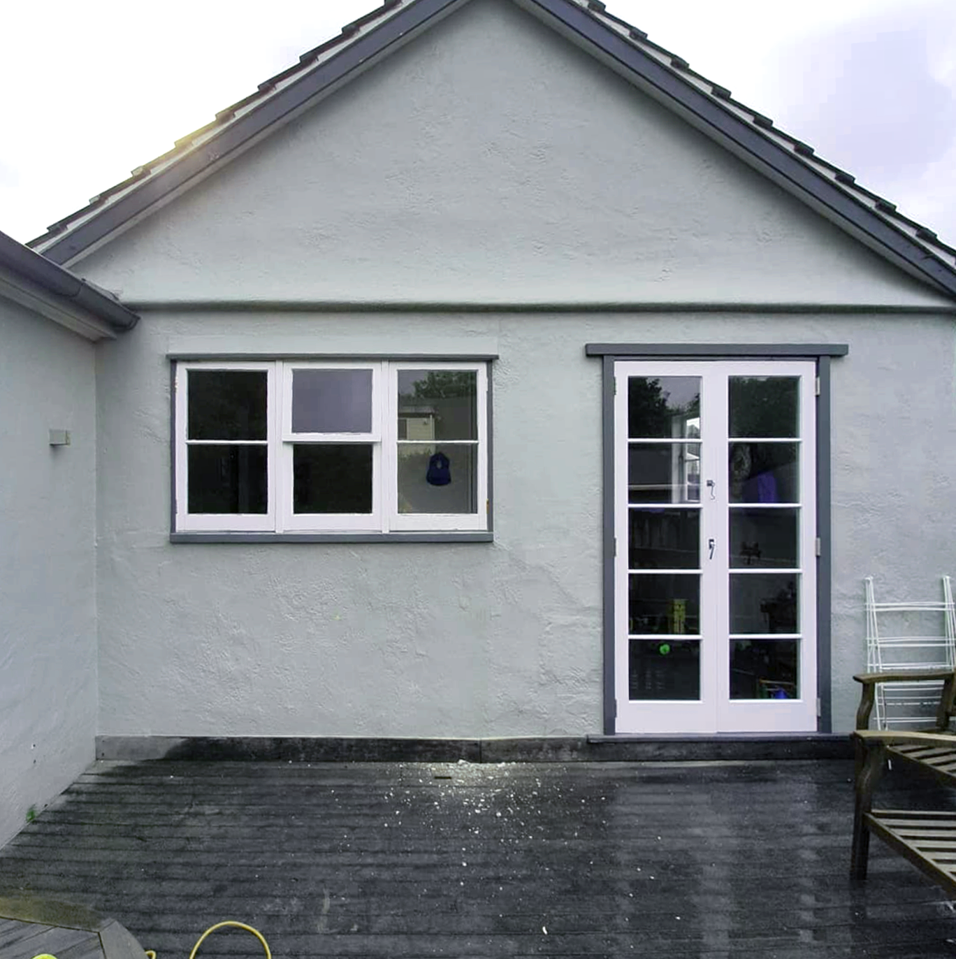 Residential exterior window transformed into door by Norsewood Builders