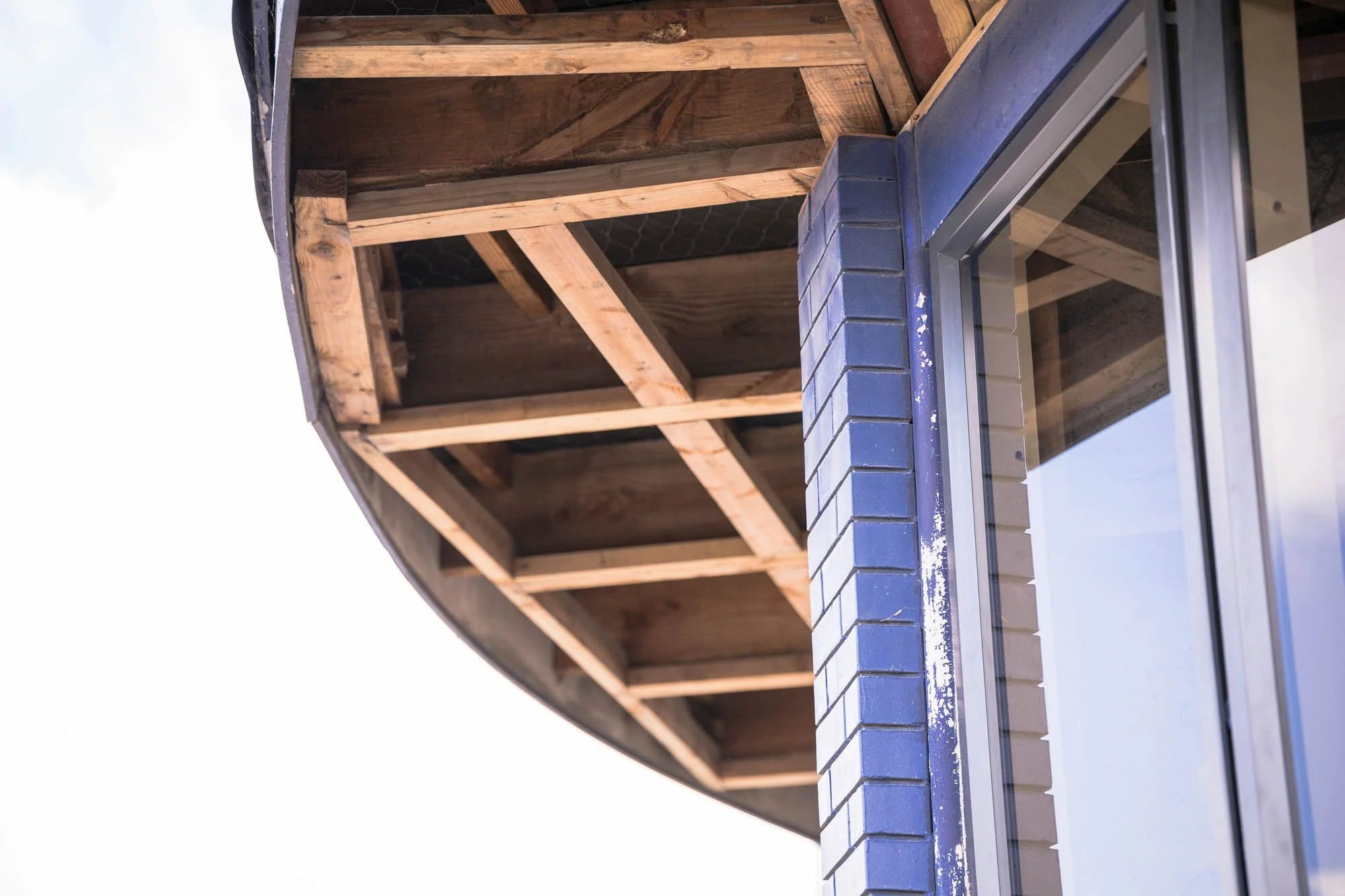 Restoration of the original curved bullnose awning by Norsewood Builders in Hamilton