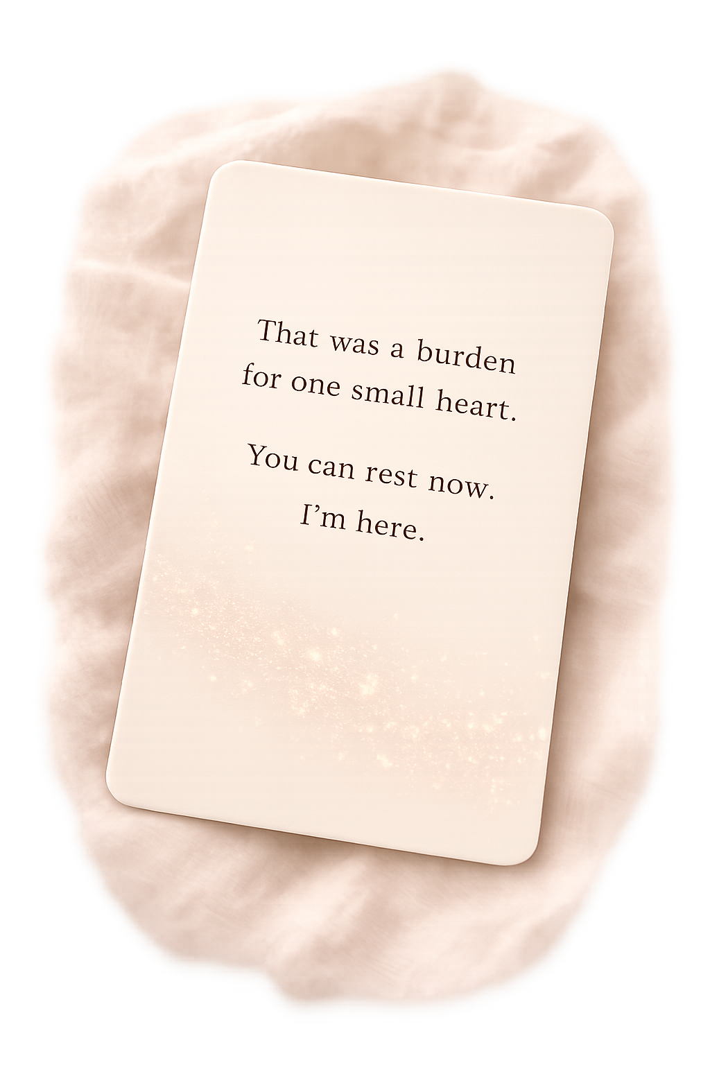 A sympathy card with a message resting on a soft, fluffy fabric background.