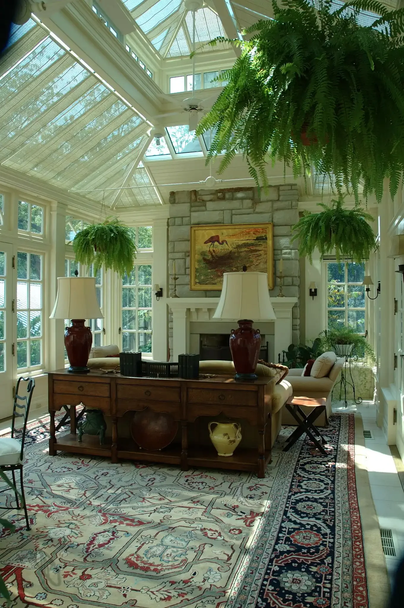luxury-hardwood-garden-room-interior-fireplace.webp