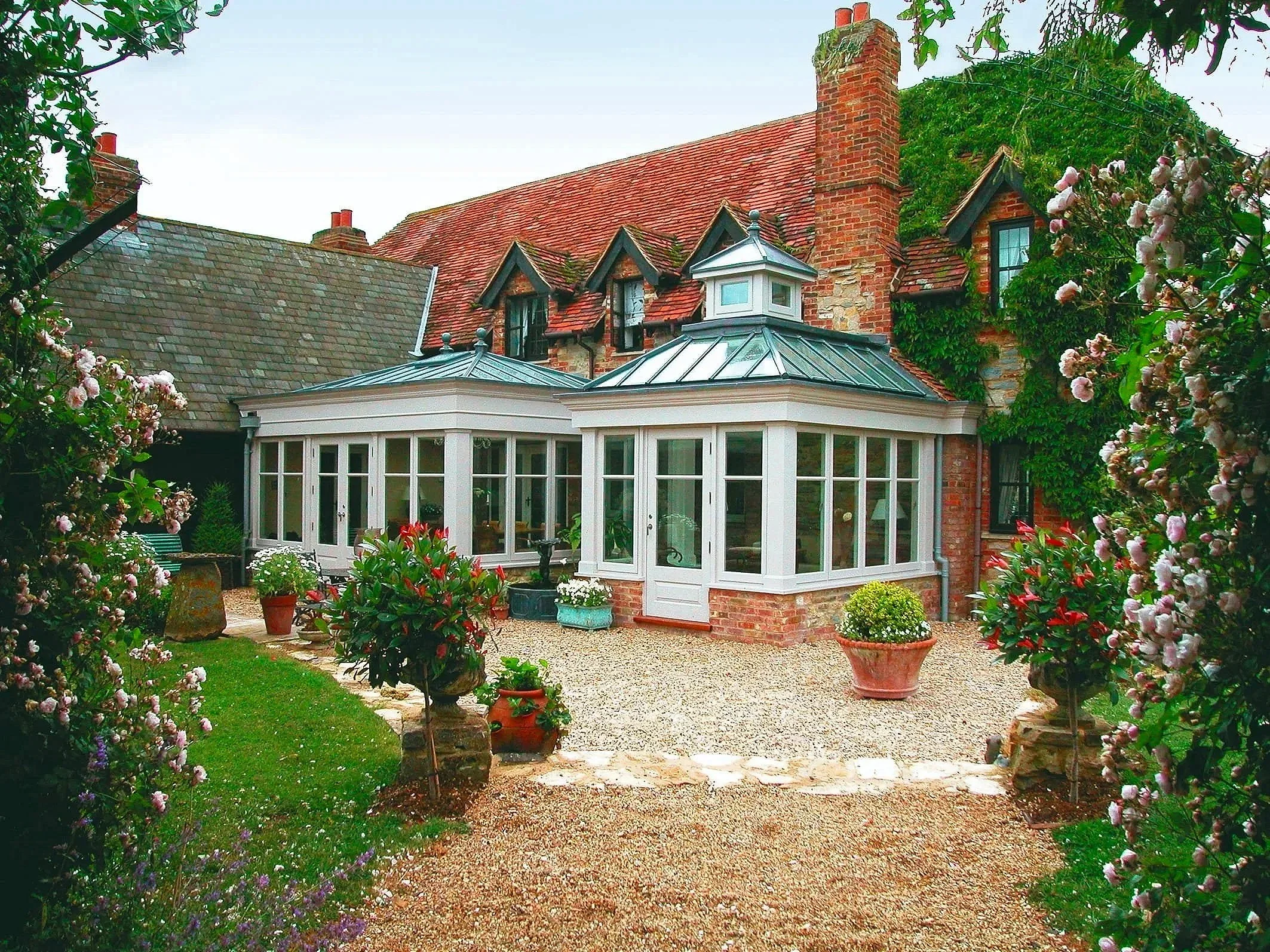 contemporary james alexander sun room extension to listed Hampshire red brick residence
