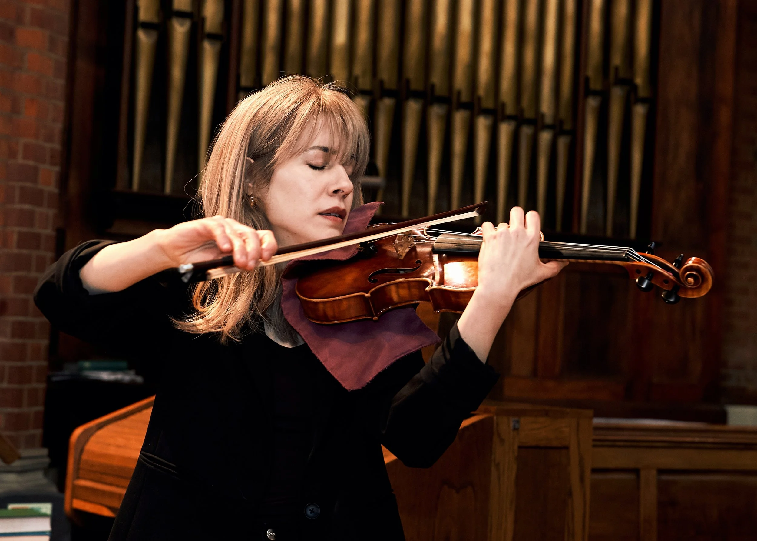 Violinist Talia Ramos playing the violin