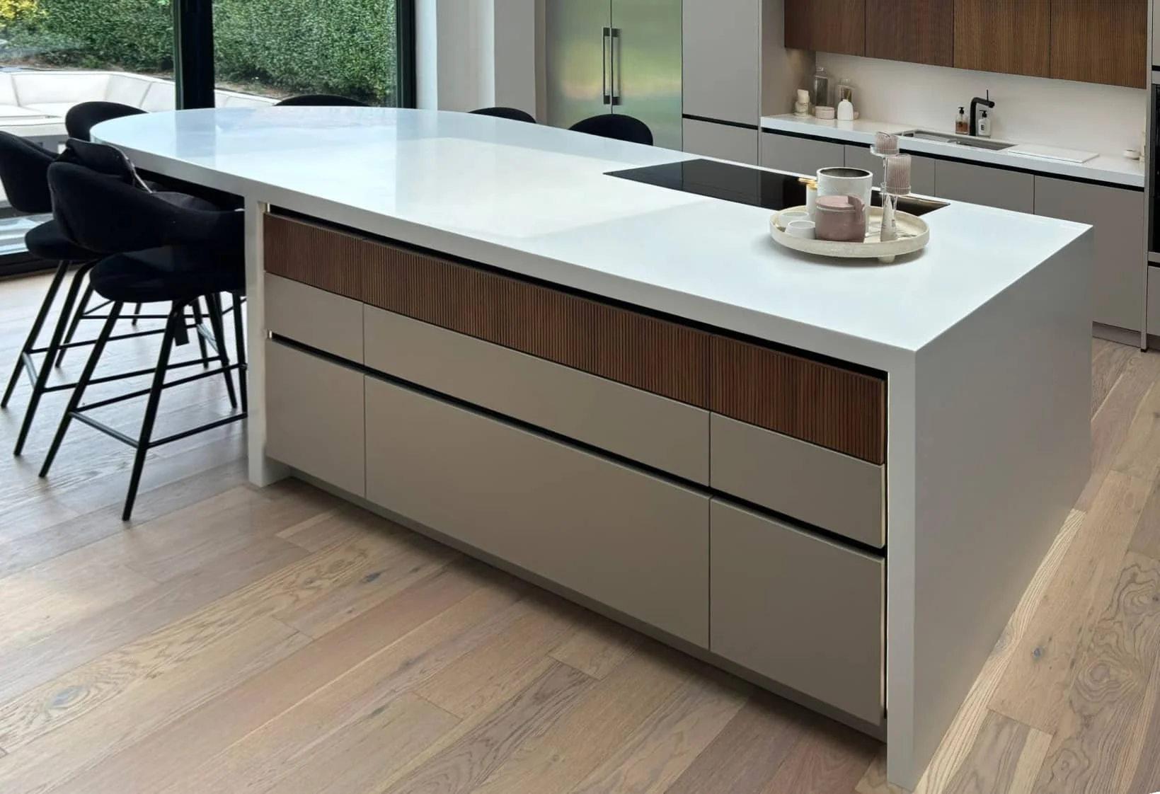 Modern Häcker Systemat kitchen in fluted walnut with brushed bronze island -IMG_5144-2000x1500_edited.jpeg