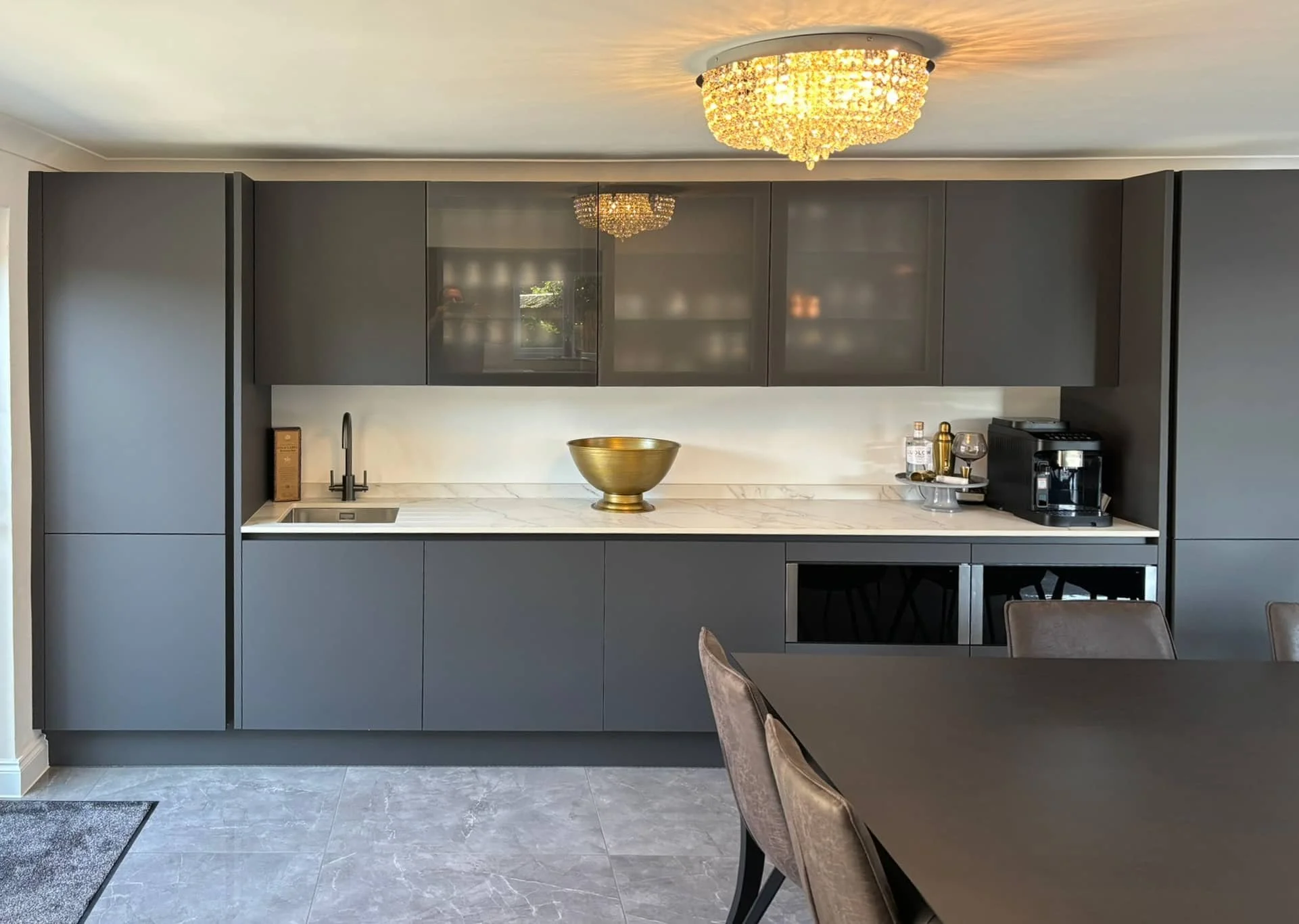 Graphite Kitchen with Dining Serving Area in Brigsley