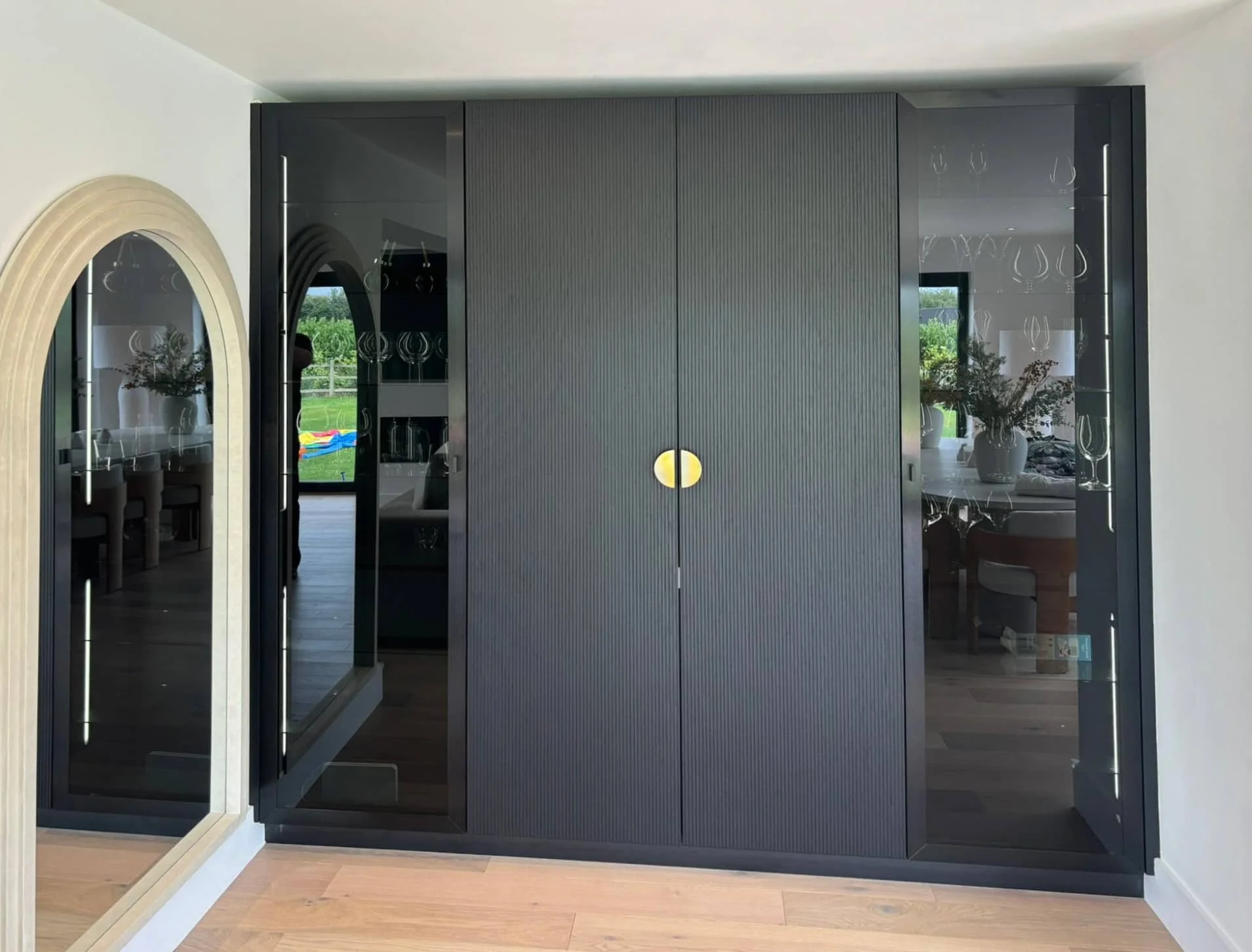 Modern Häcker Systemat kitchen in fluted walnut with brushed bronze island -IMG_5131-2000x1500_edited.jpeg