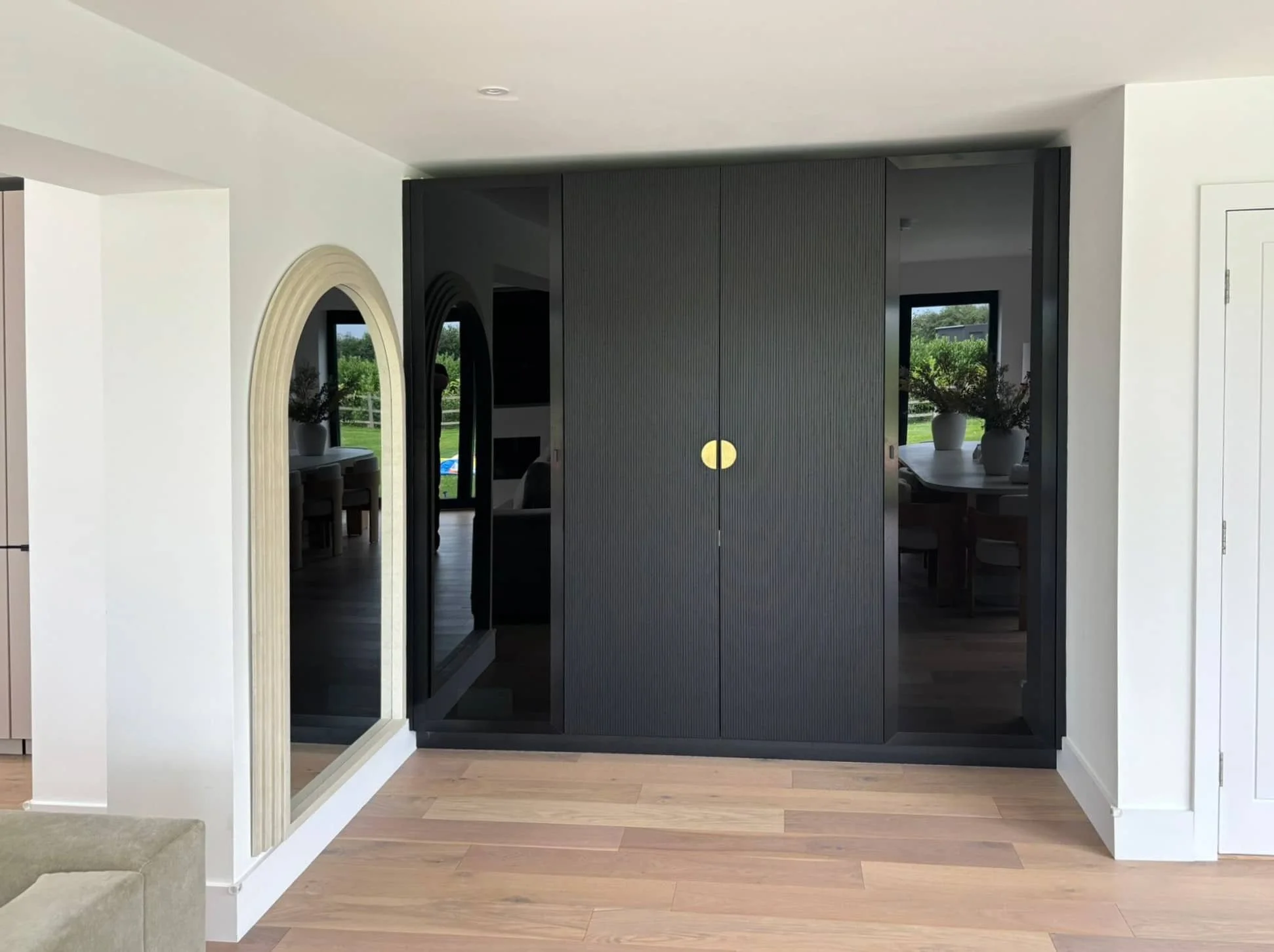 Modern Häcker Systemat kitchen in fluted walnut with brushed bronze island -IMG_5129-2000x1500_edited.jpeg