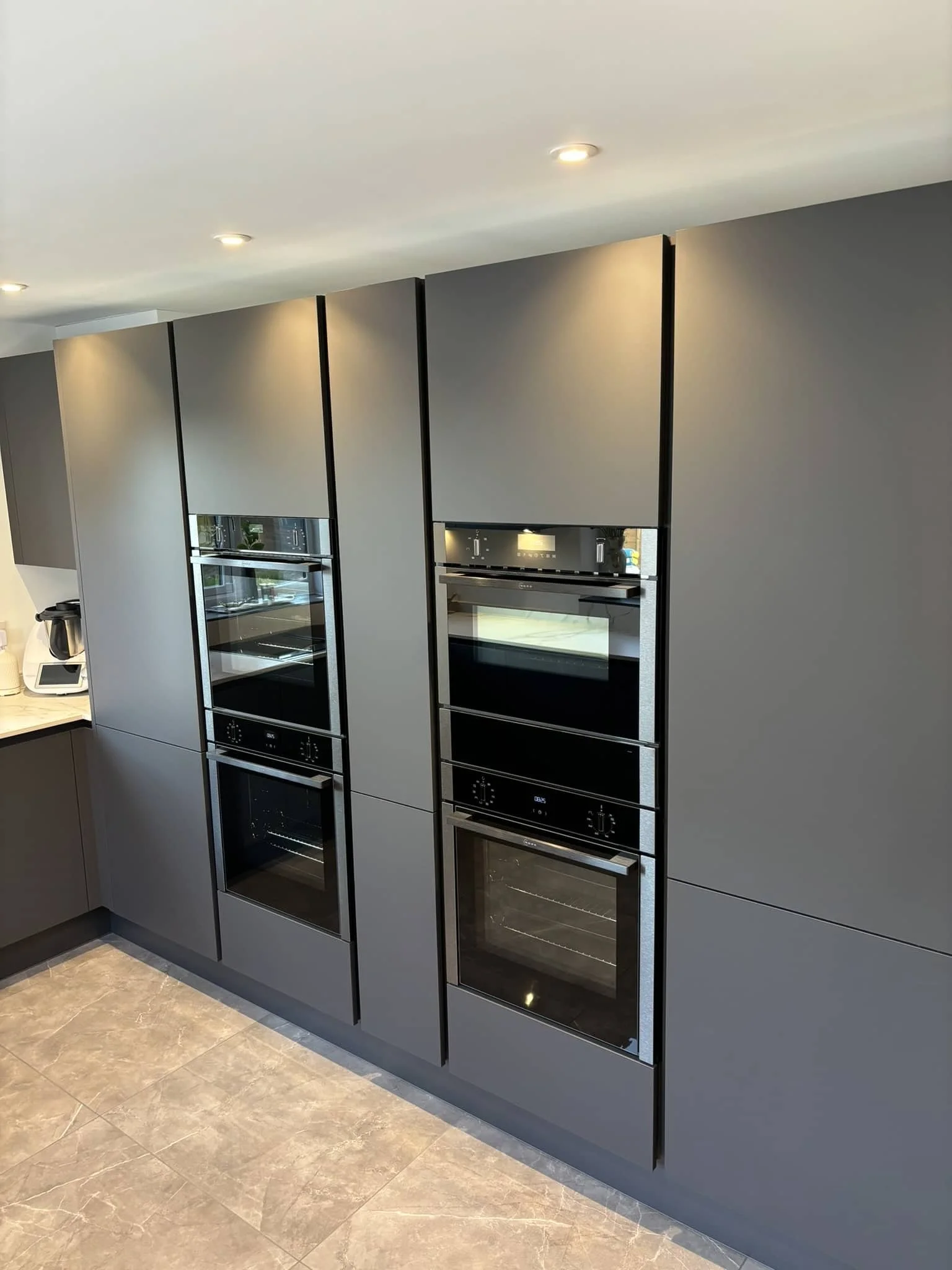 Graphite Kitchen with Dining Serving Area in Brigsley