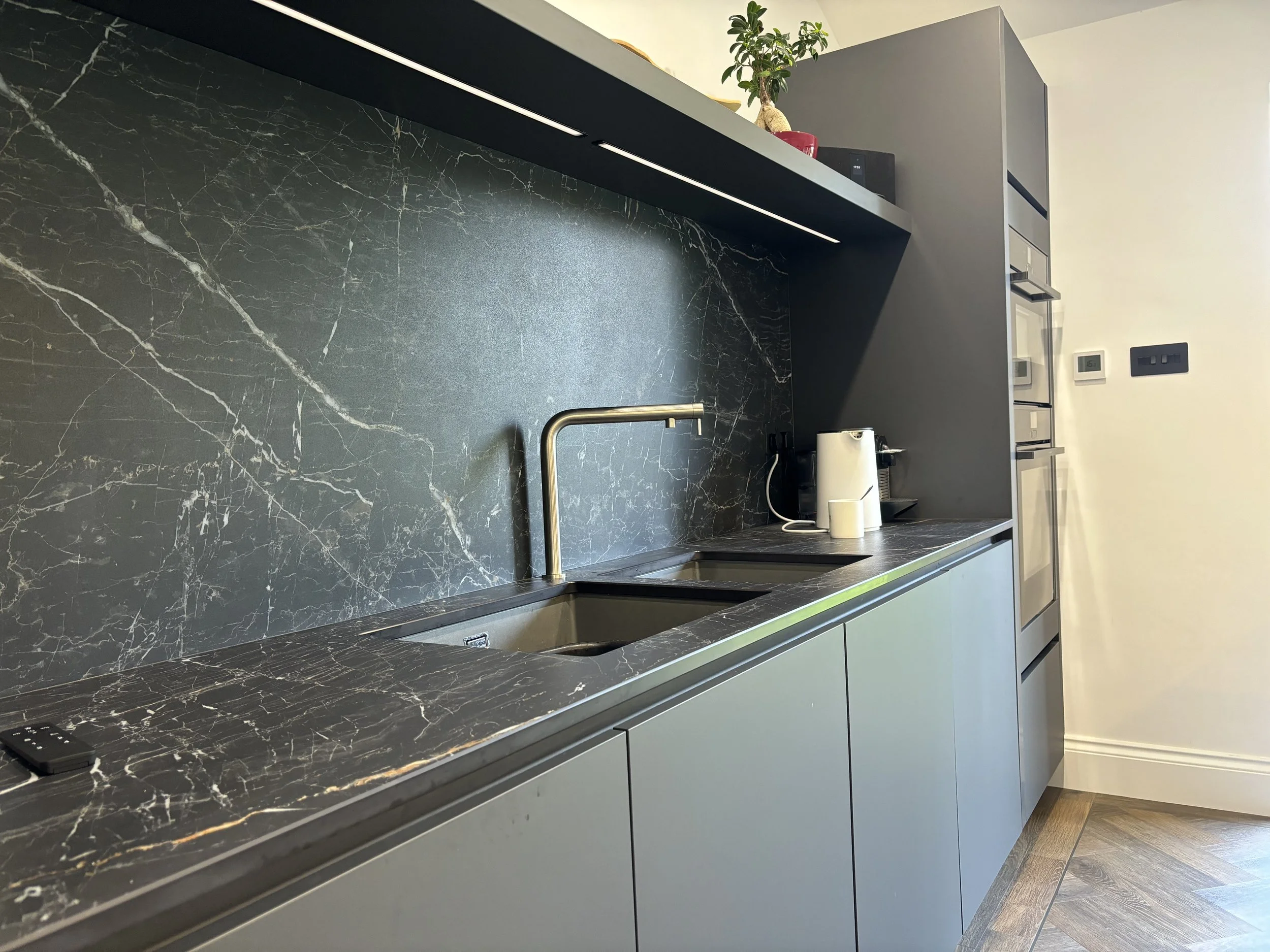 Modern Häcker kitchen with graphite and concrete-look contrast-IMG_3240.jpeg