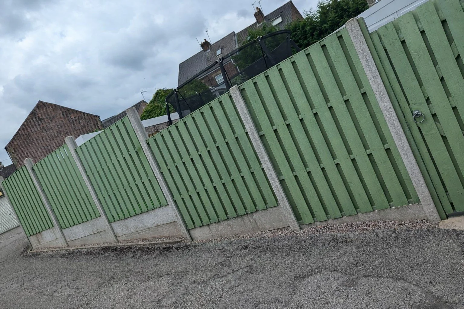 Exterior fence panels painted green completed project in Mosborough, Sheffield.