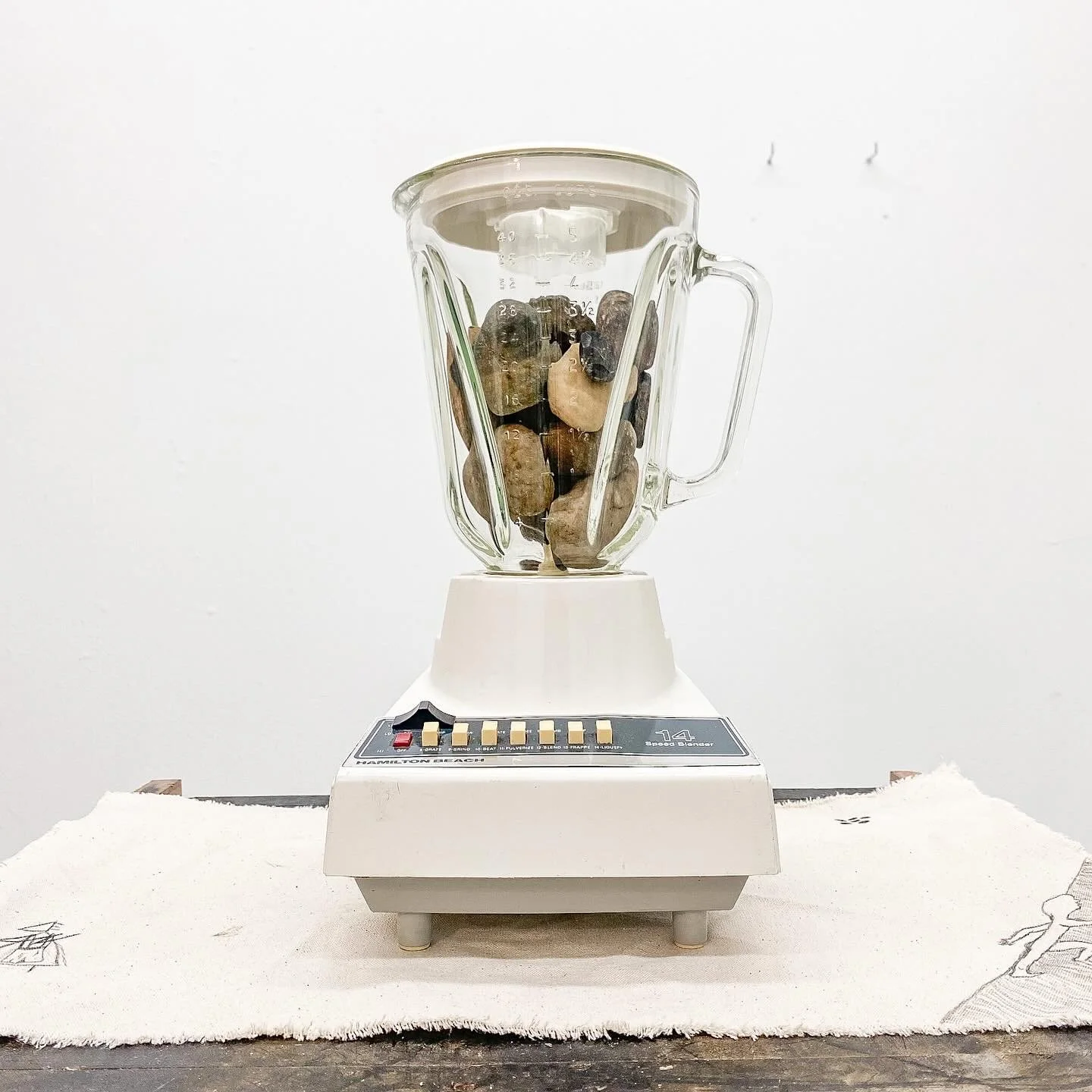 Power, glass pitcher blender, river rocks, 2024