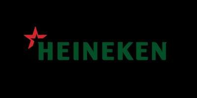 Heineken logo with red star and green text on a black background.