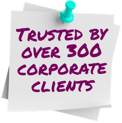 Note pinned on a board stating, 'Trusted by over 300 corporate clients' in purple text.