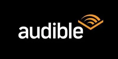 Audible logo with the word 'audible' in white lowercase letters and an orange sound wave symbol above the letter 'l' on a black background.