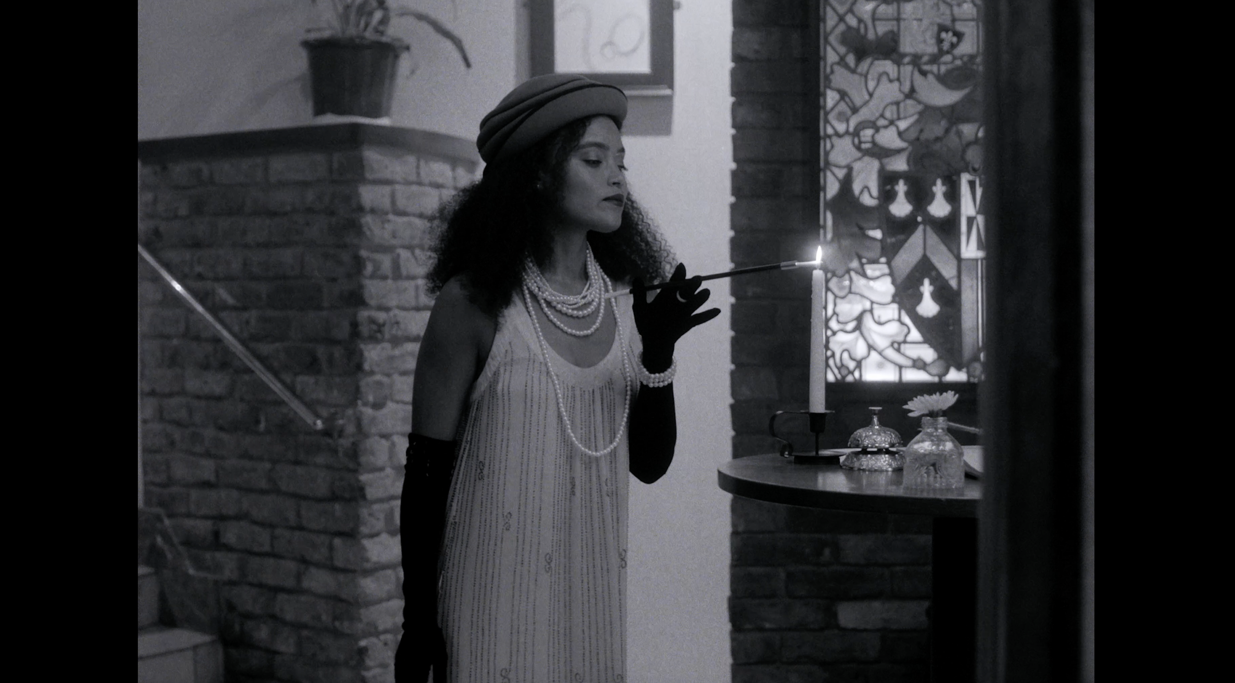 Copy of Lara - lighting cig, B&W.png