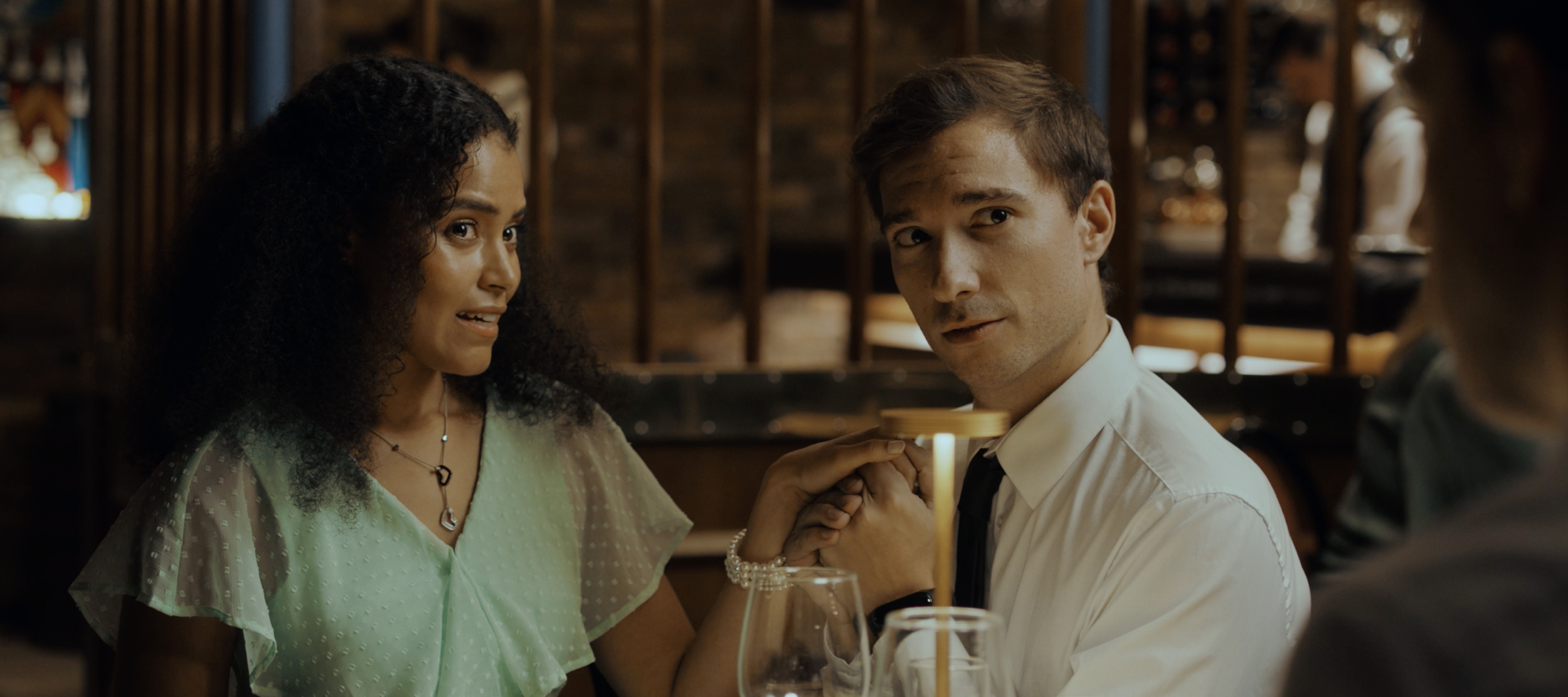 Copy of Lara & Spanish Waiter - holding hands.png