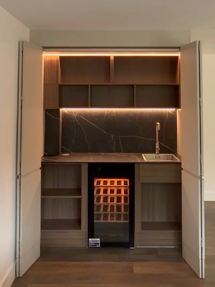 A hidden bar, thoughtfully designed and made to measure.

From the initial build to the finer finishing details, every element of this bespoke piece has been carefully considered.

A little glimpse behind the making of something rather special.

Barn