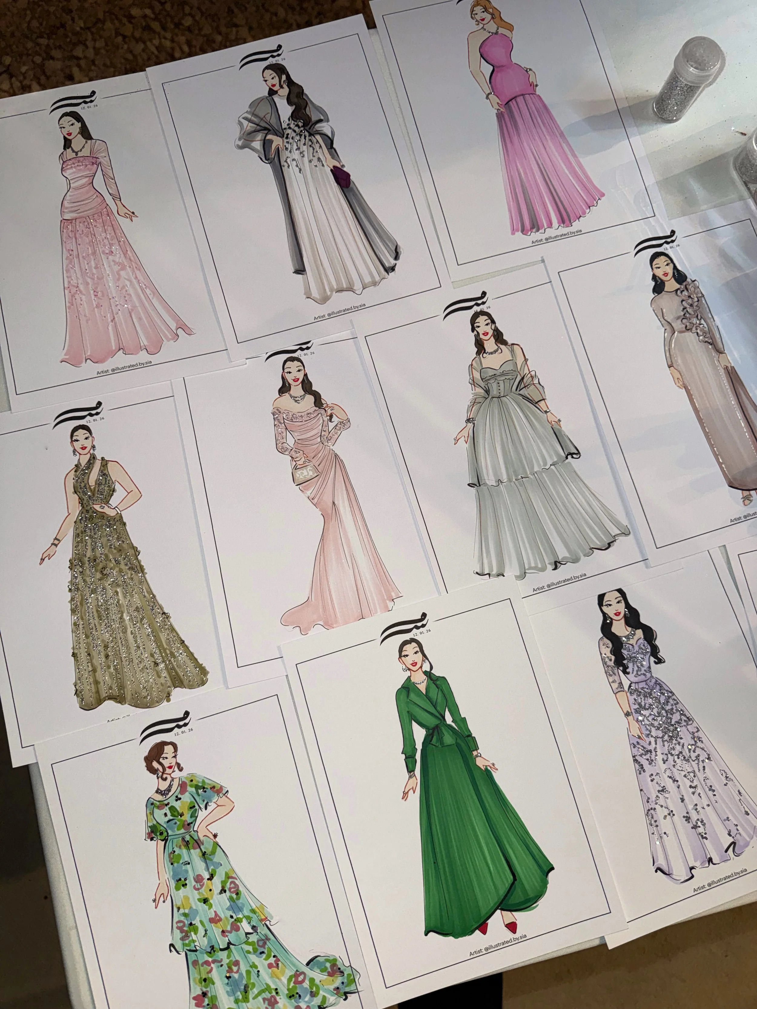 Collection of illustrated fashion sketches created during wedding or event