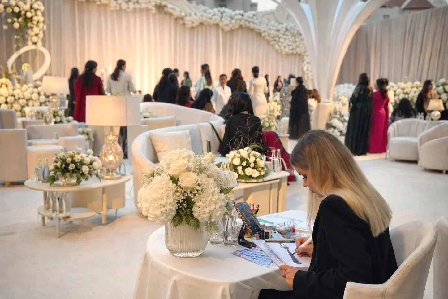 Live fashion illustration created during luxury wedding reception