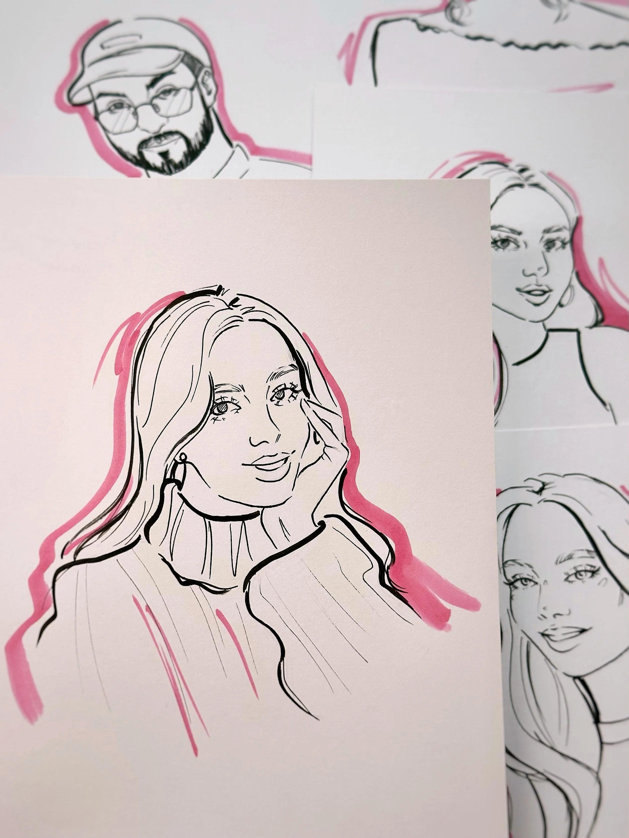 Line drawing of a woman with long hair, wearing earrings, smiling and touching her face, with a pink outline.