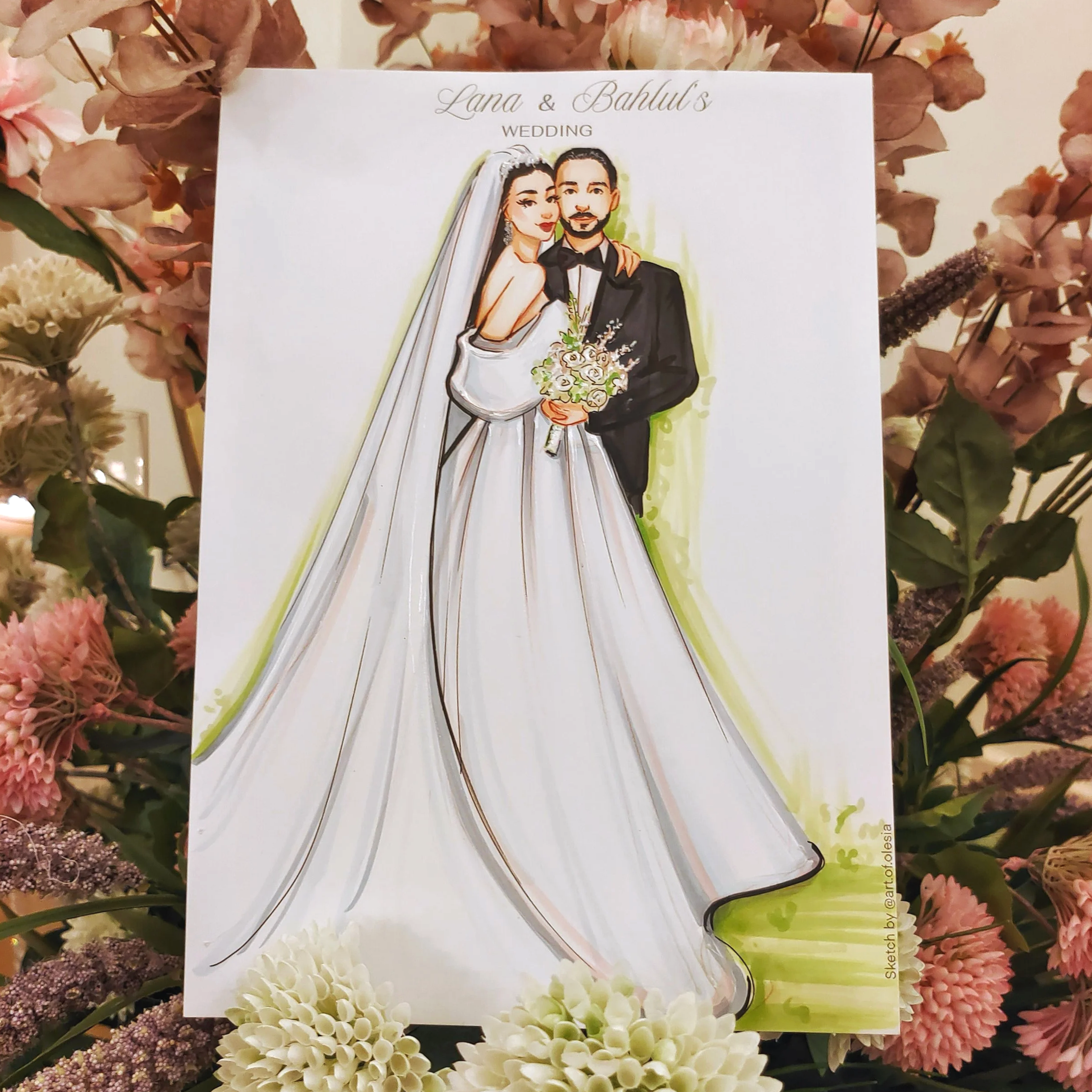 A framed fashion wedding portrait of a bride and groom, created live during wedding
