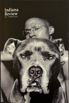 Cover of Indiana Review magazine featuring a man with glasses behind a large dog with a serious expression in black and white.