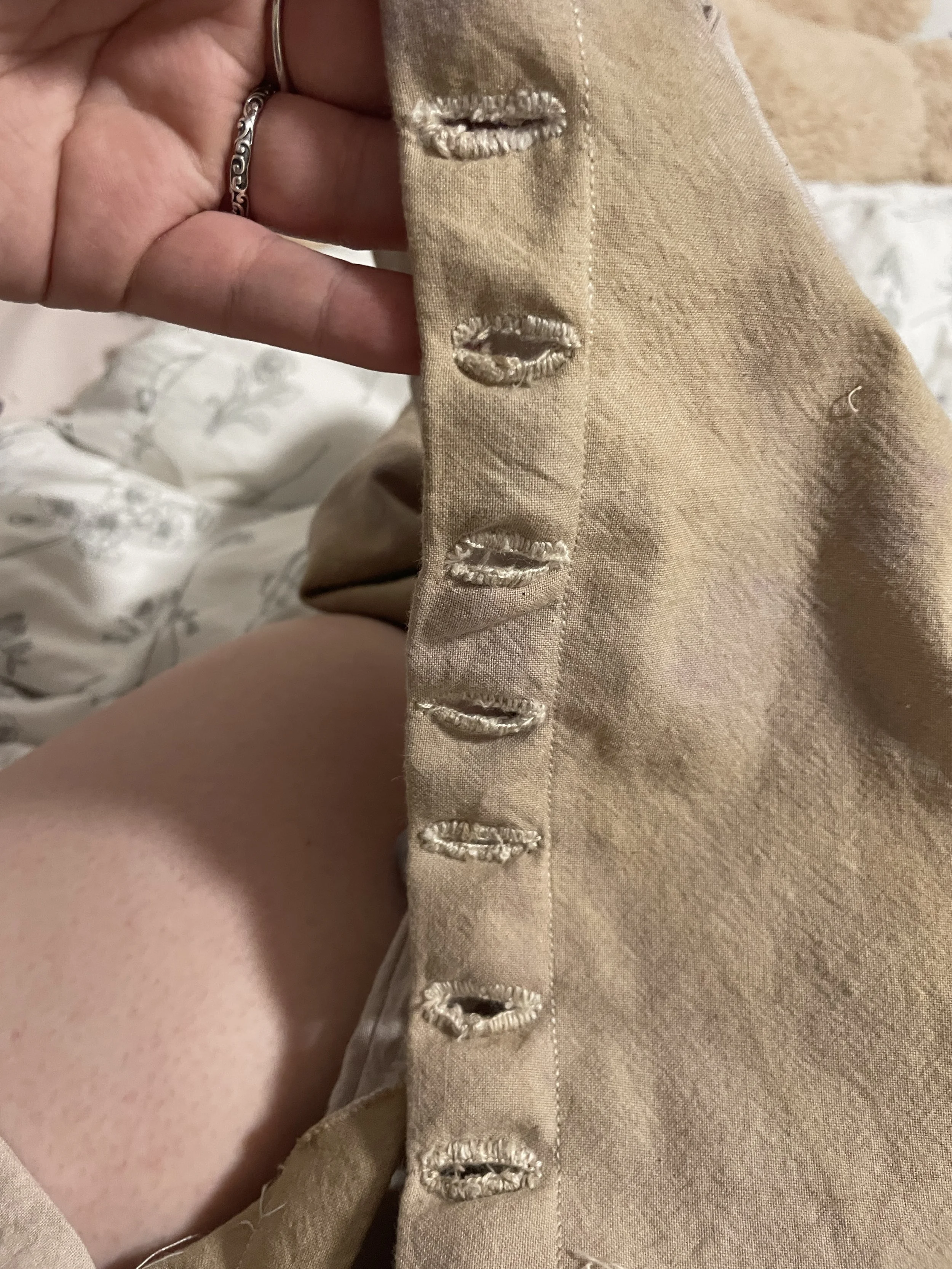 Hand-sewn button holes