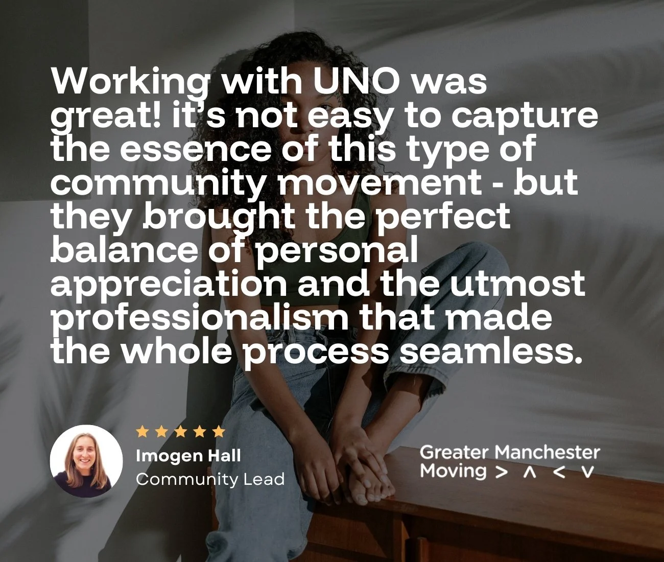 A woman with curly hair sitting on a wooden surface, with a quote overlay from Greater Manchester Moving about working with UNO and high quality of video campaign work
