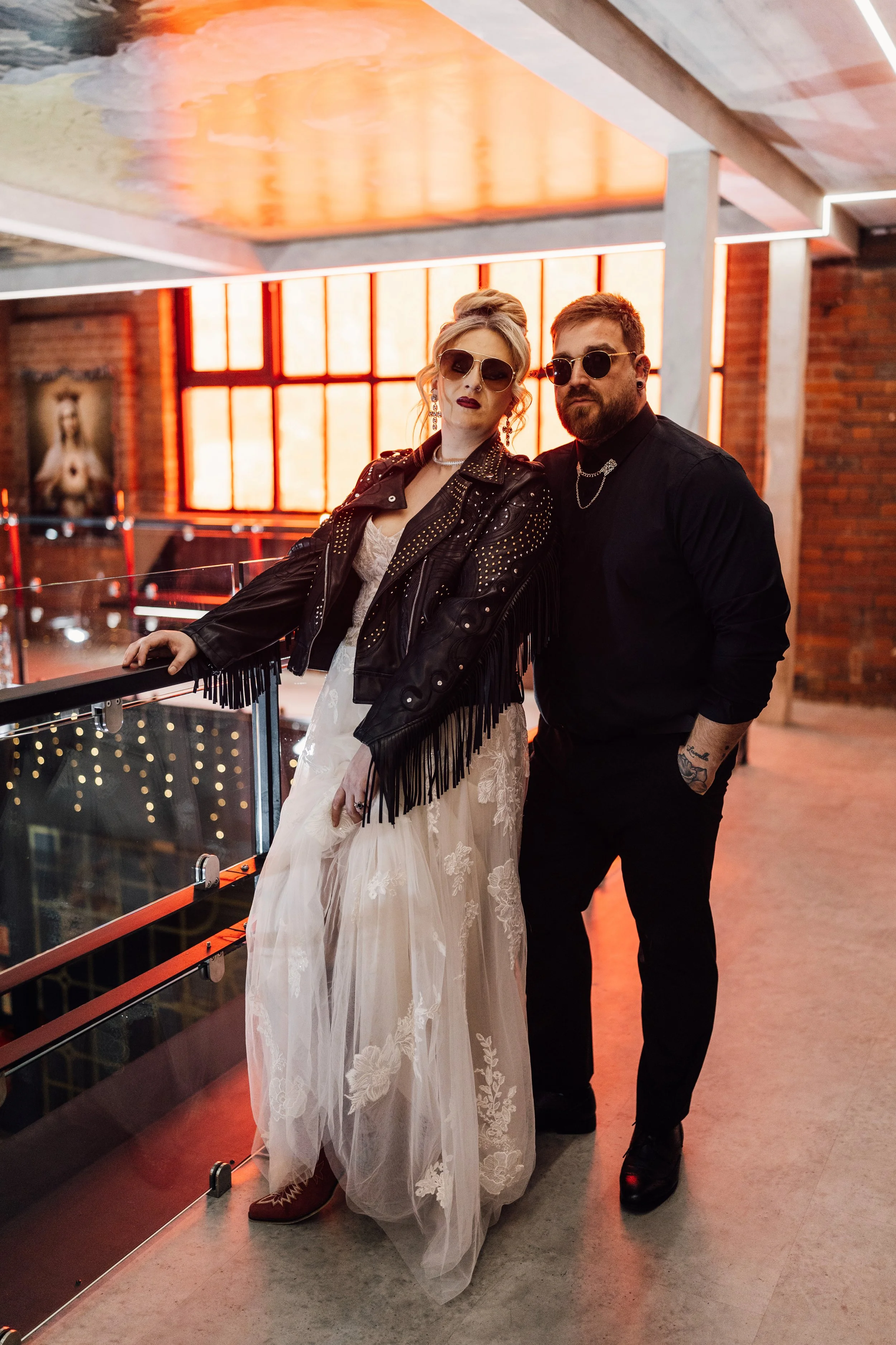 Bride and groom portrait on balcony at Church Temple of Fun wedding venue Sheffield